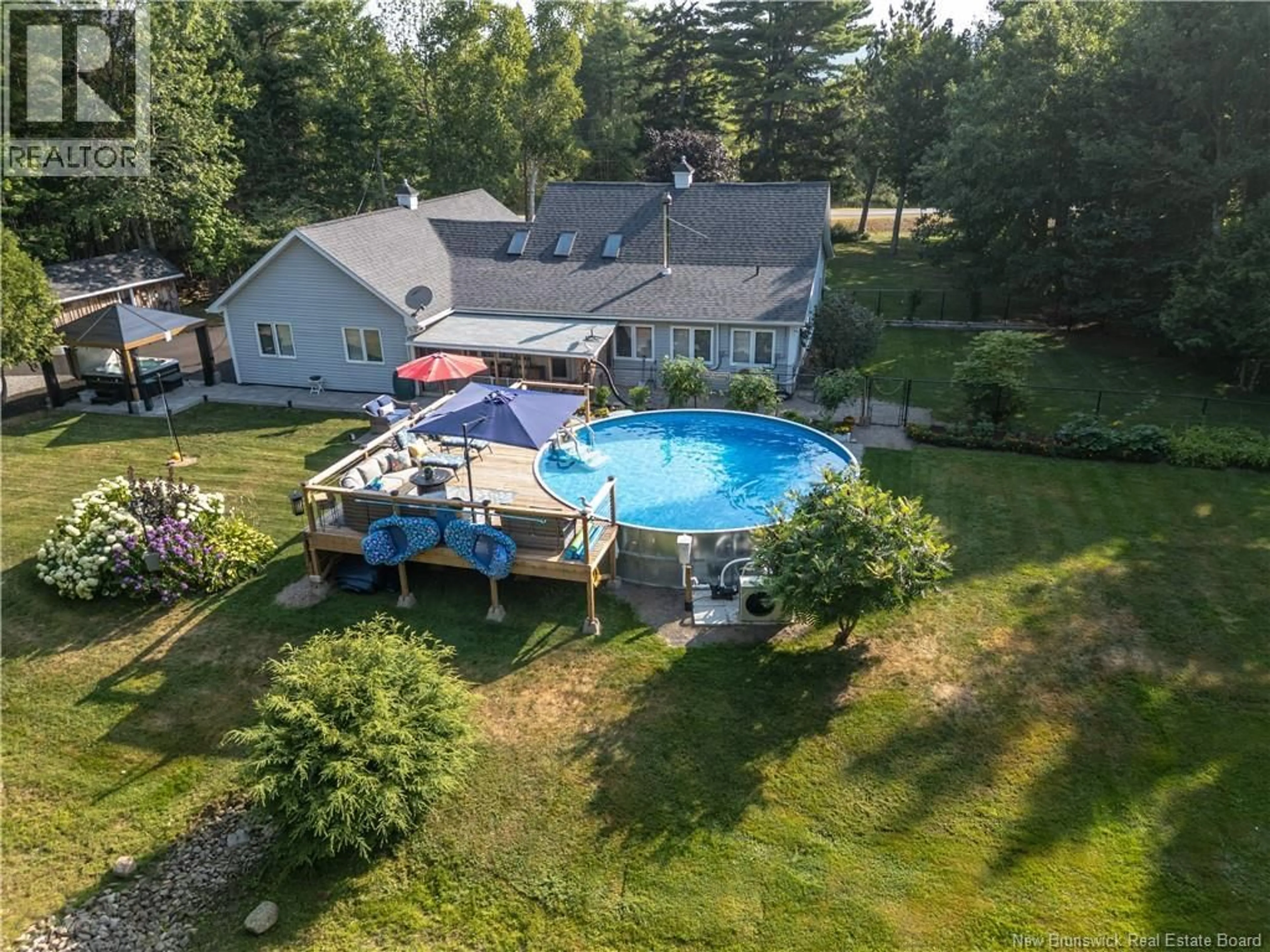 A pic from outside/outdoor area/front of a property/back of a property/a pic from drone, water/lake/river/ocean view for 7190 101 ROUTE, Wirral New Brunswick E5L2P3
