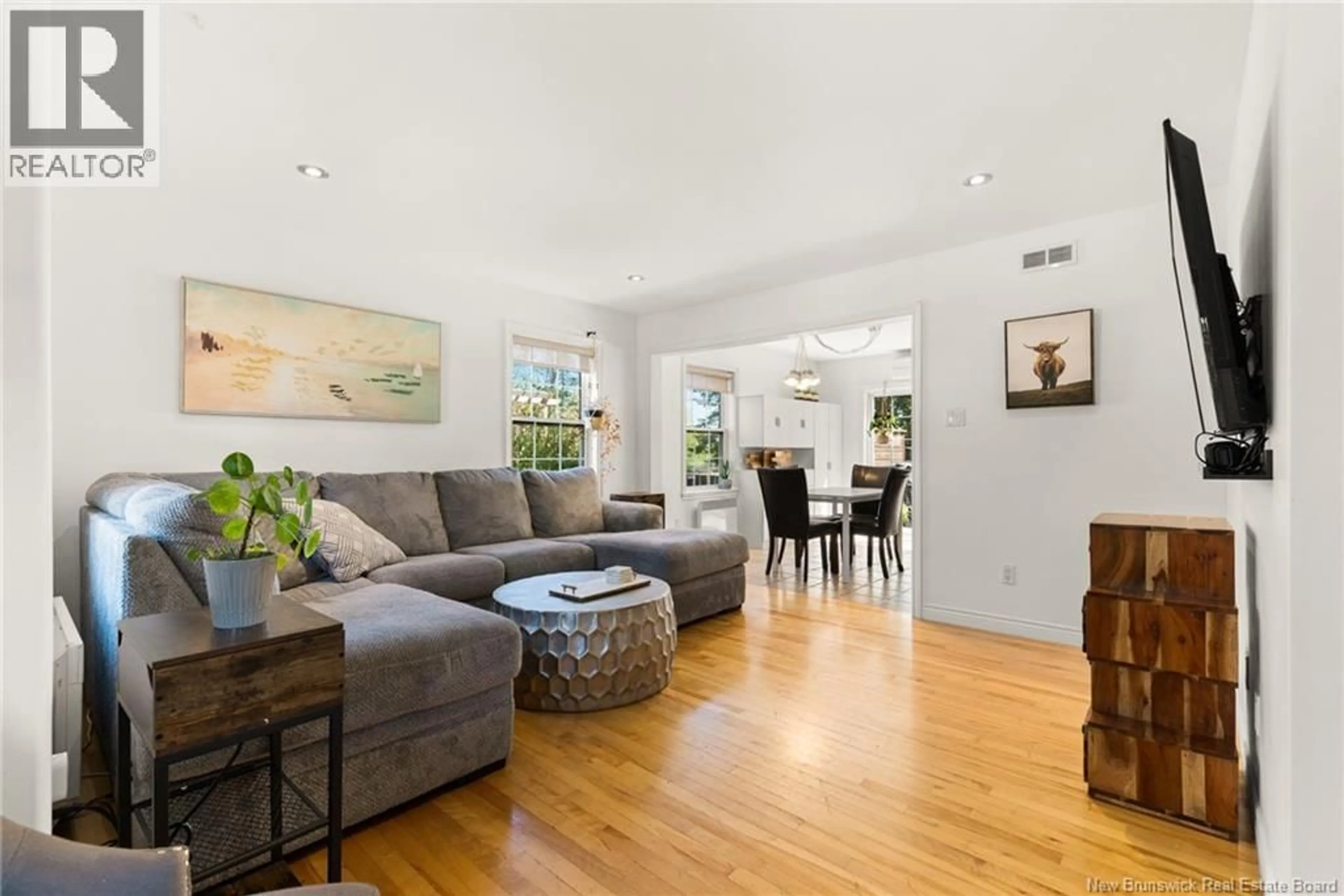 Living room with furniture, wood/laminate floor for 35 DU RUISSEAU STREET, Dieppe New Brunswick E1A7Z8