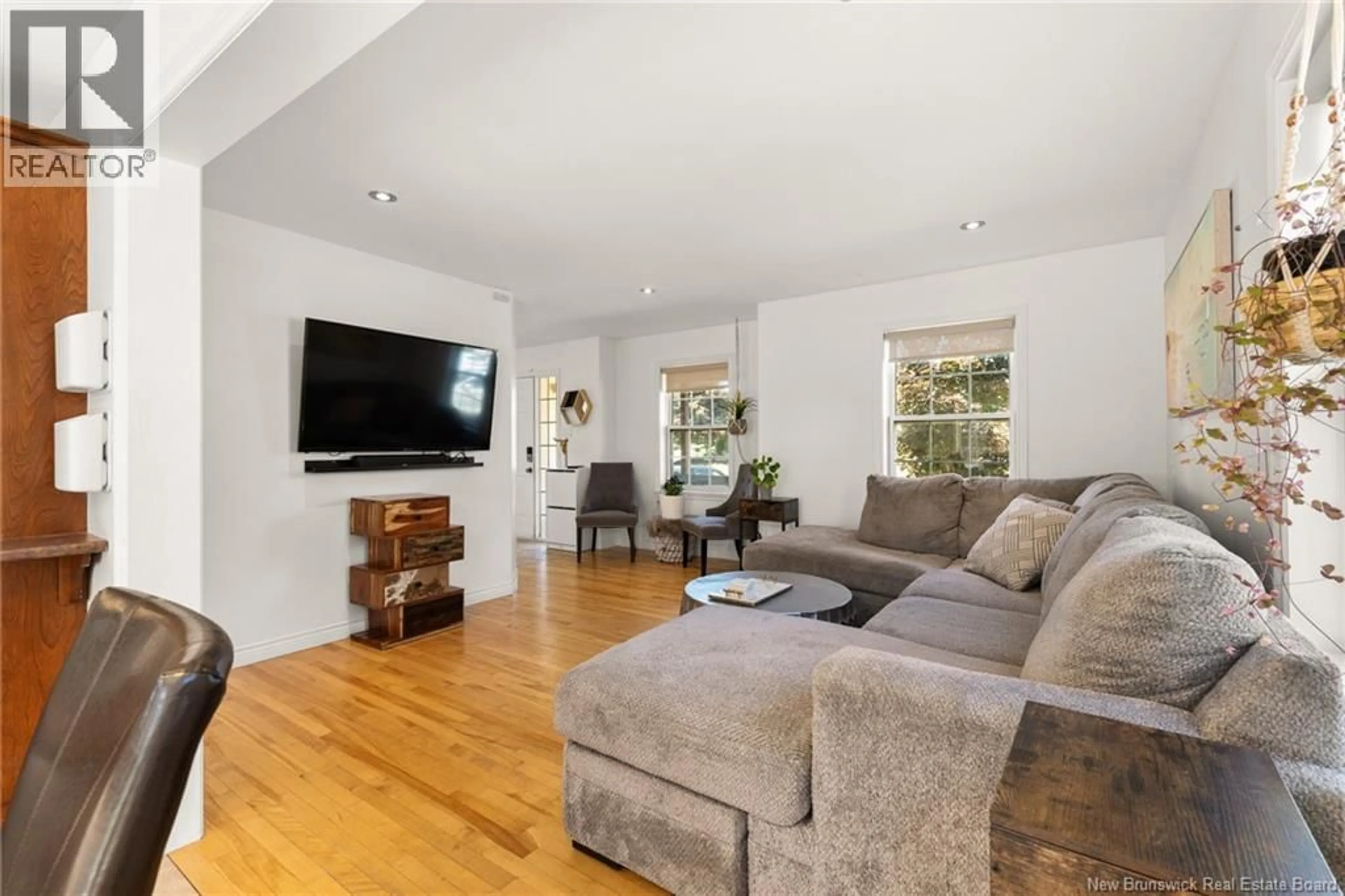 Living room with furniture, wood/laminate floor for 35 DU RUISSEAU STREET, Dieppe New Brunswick E1A7Z8