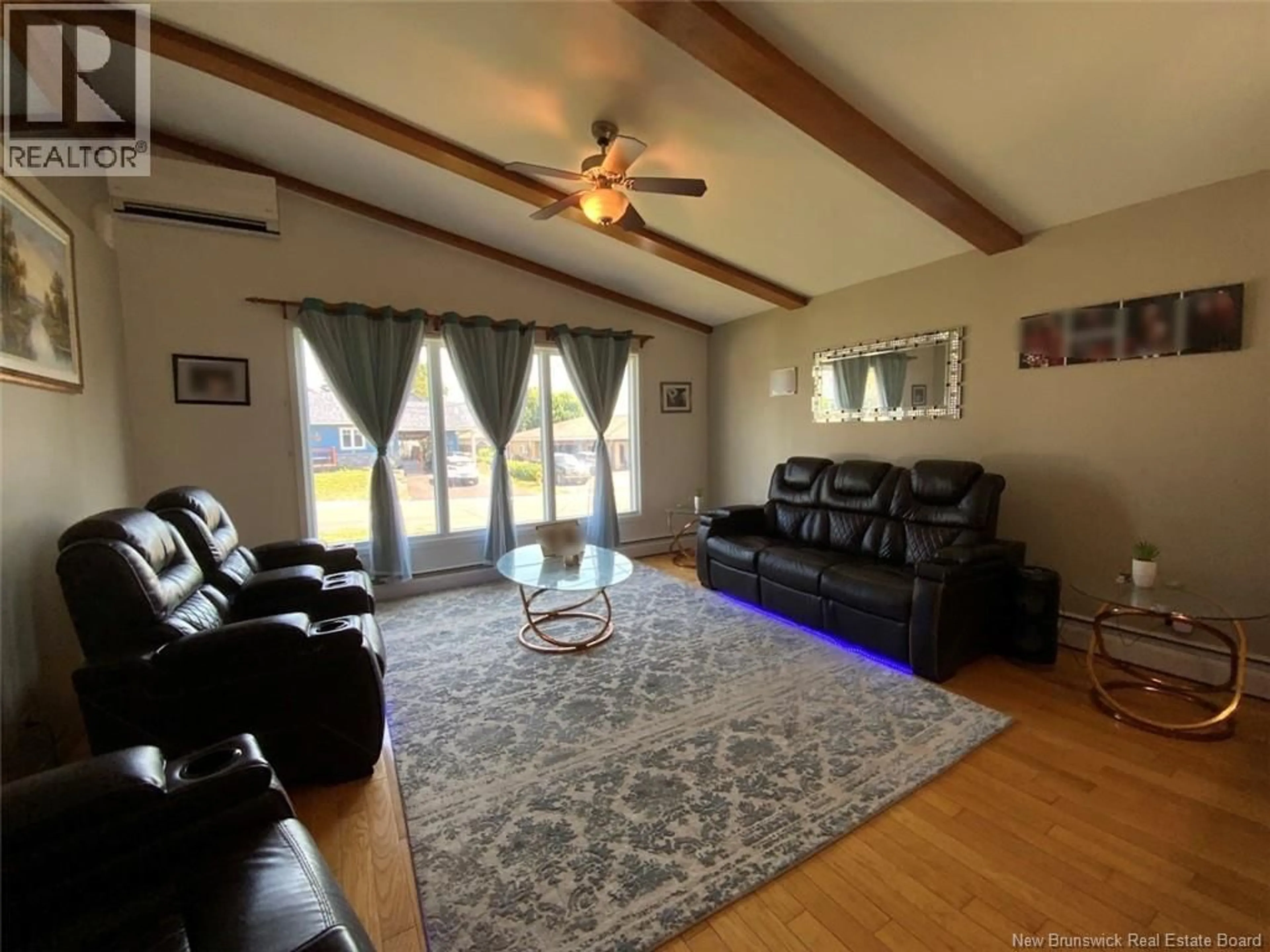 Living room with furniture, unknown for 28 47E AVENUE, Edmundston New Brunswick E3V3C2