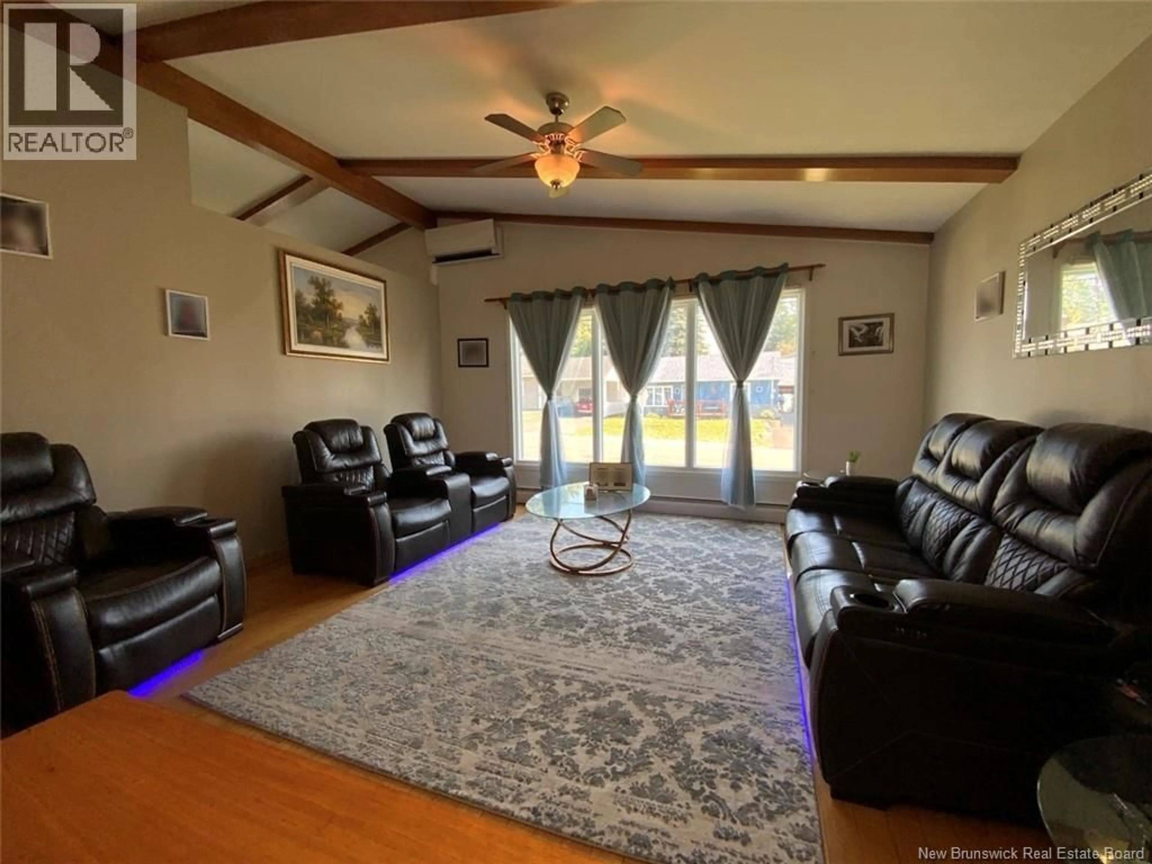 Living room with furniture, unknown for 28 47E AVENUE, Edmundston New Brunswick E3V3C2