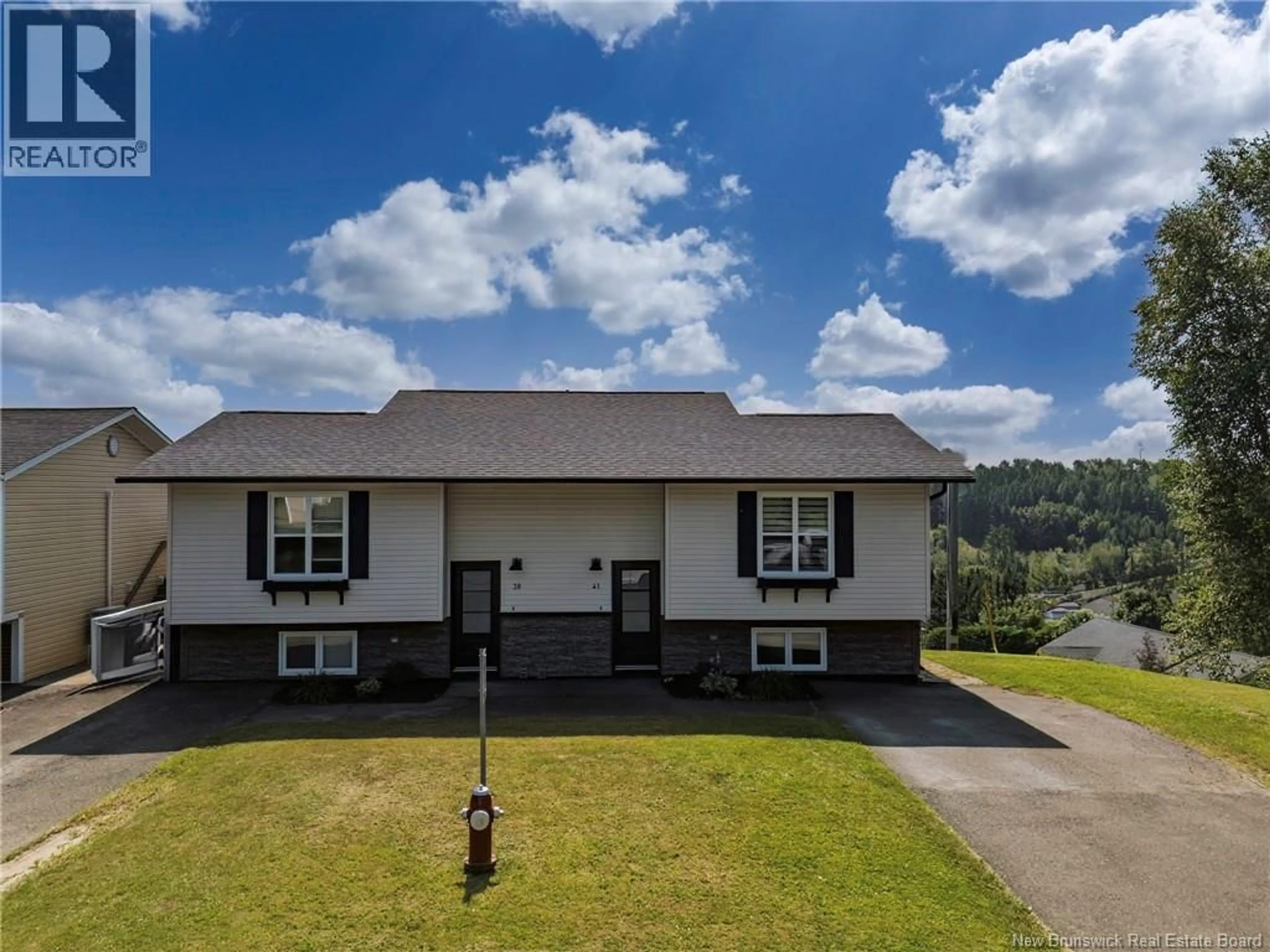 A pic from outside/outdoor area/front of a property/back of a property/a pic from drone, water/lake/river/ocean view for 39-41 BELAIR STREET, Grand Falls New Brunswick E3Y1A8