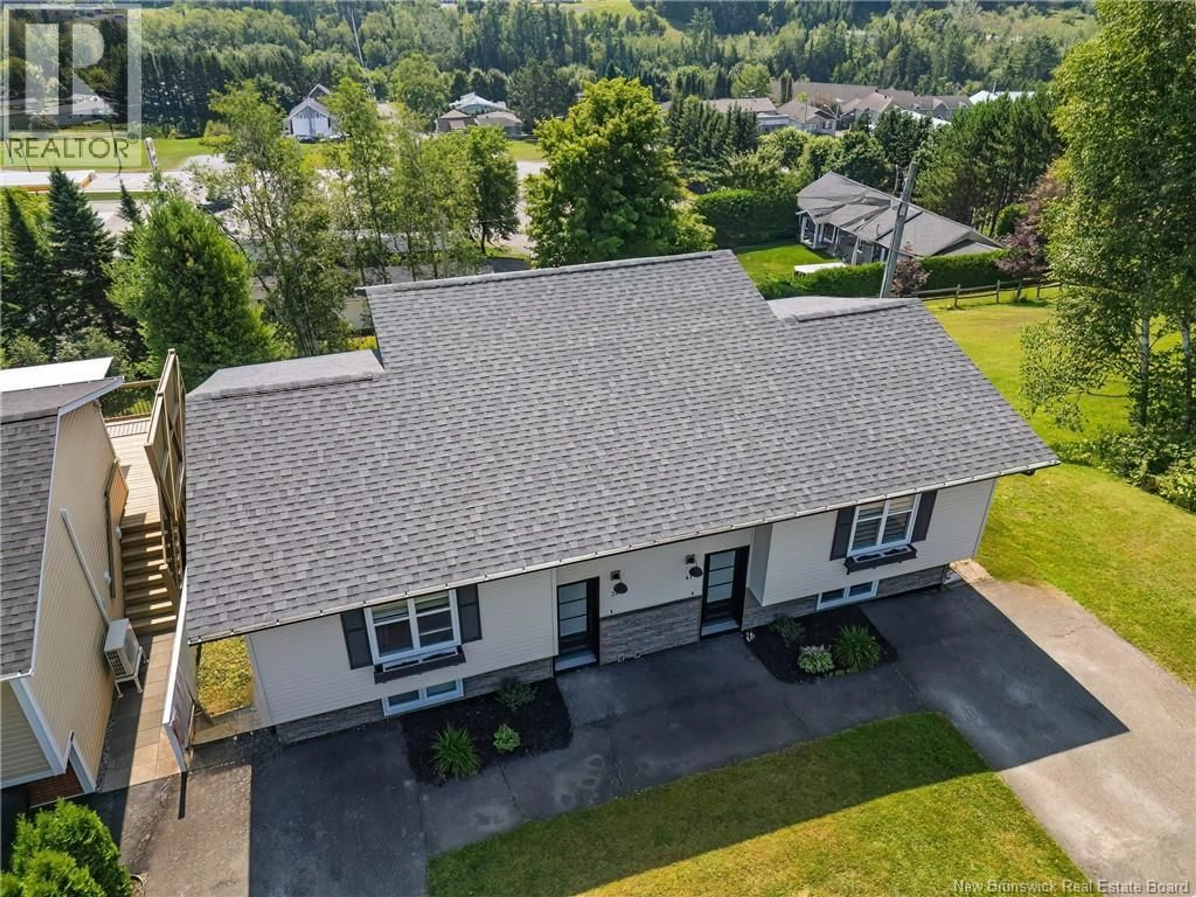 A pic from outside/outdoor area/front of a property/back of a property/a pic from drone, unknown for 39-41 BELAIR STREET, Grand Falls New Brunswick E3Y1A8