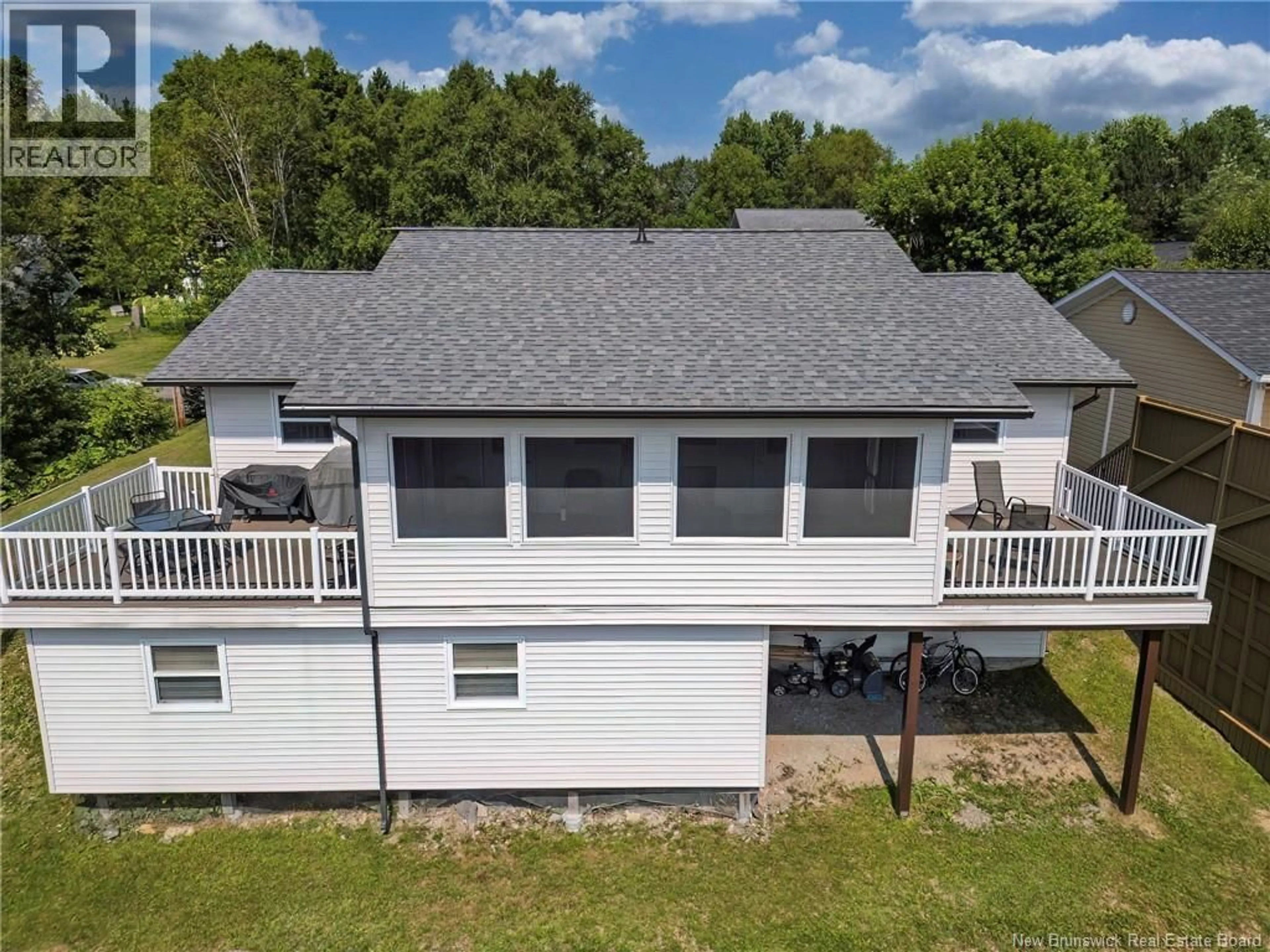 A pic from outside/outdoor area/front of a property/back of a property/a pic from drone, water/lake/river/ocean view for 39-41 BELAIR STREET, Grand Falls New Brunswick E3Y1A8