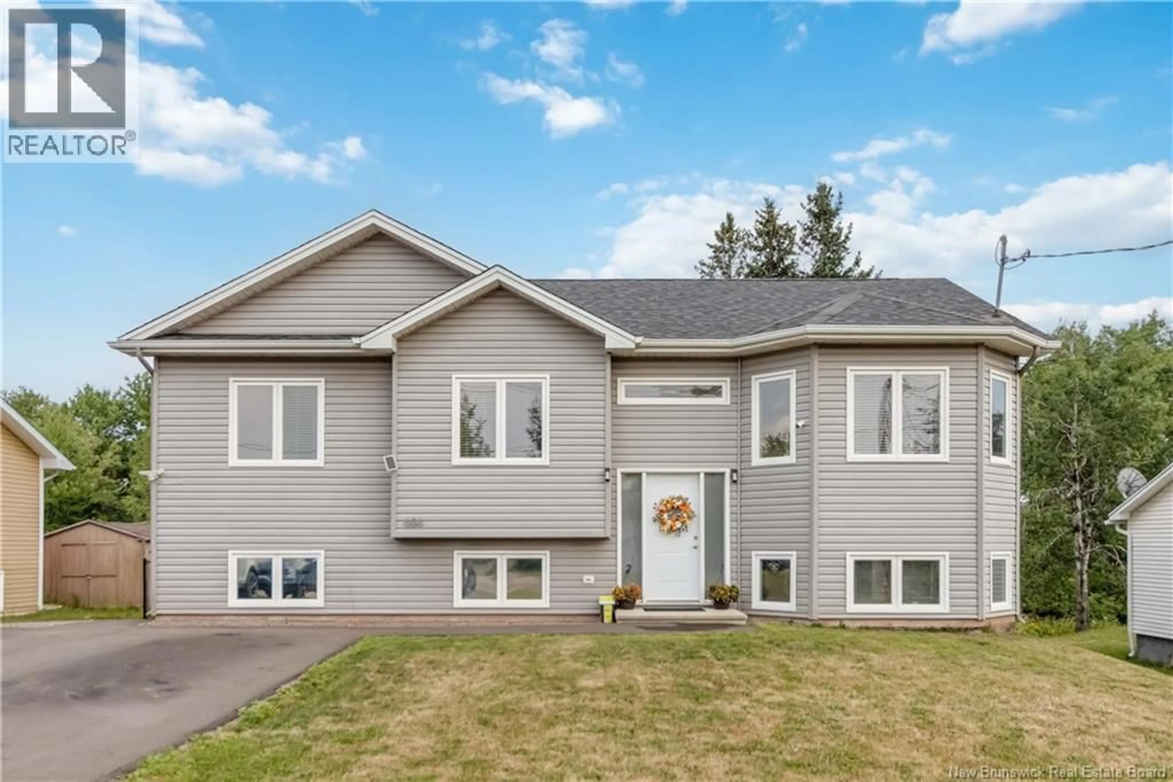Home with vinyl exterior material, street for 686-688 CHARTERSVILLE ROAD, Dieppe New Brunswick E1A1K8