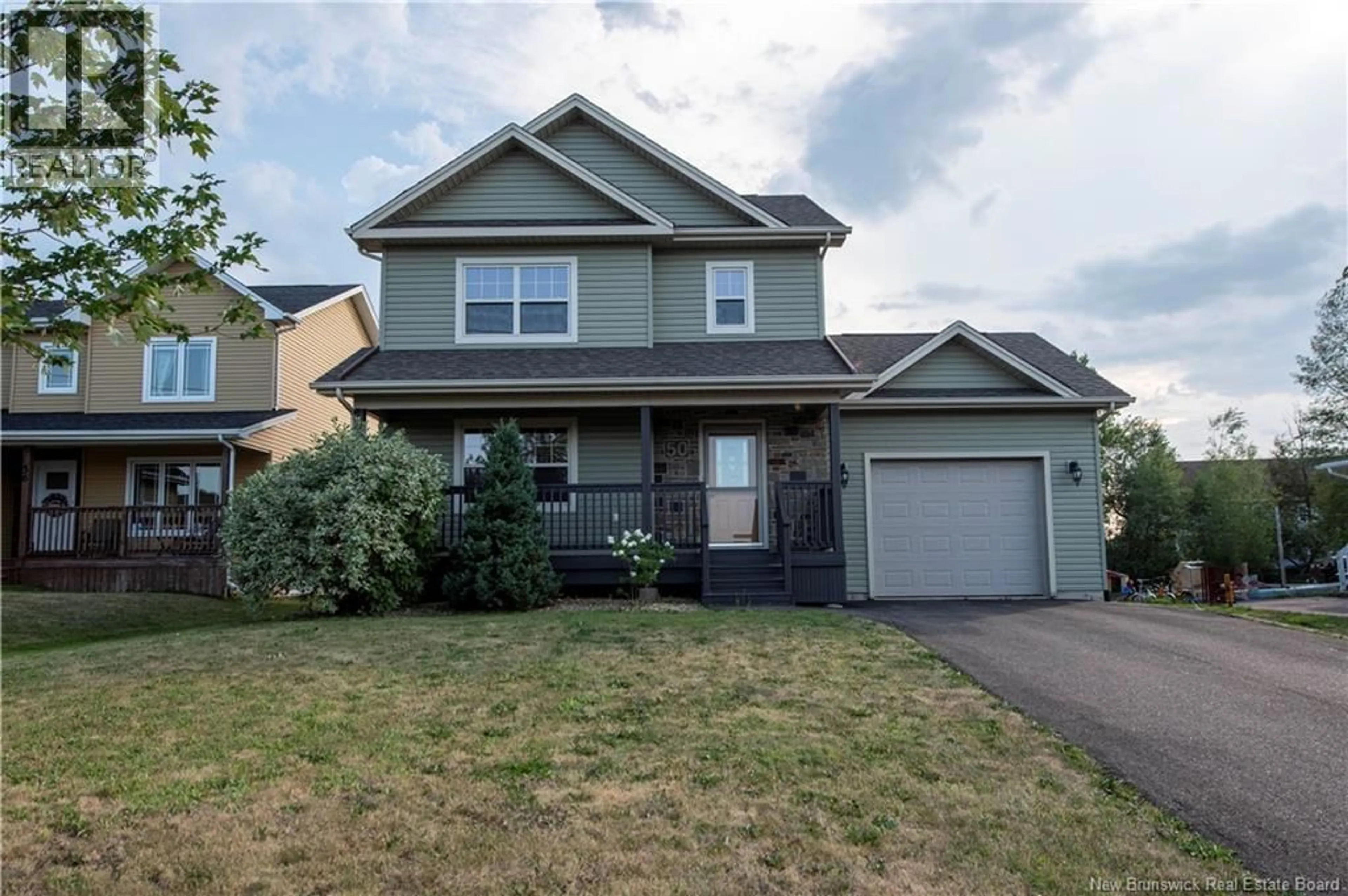 Home with vinyl exterior material, street for 50 NORTHUMBERLAND DRIVE, Moncton New Brunswick E1A6C3