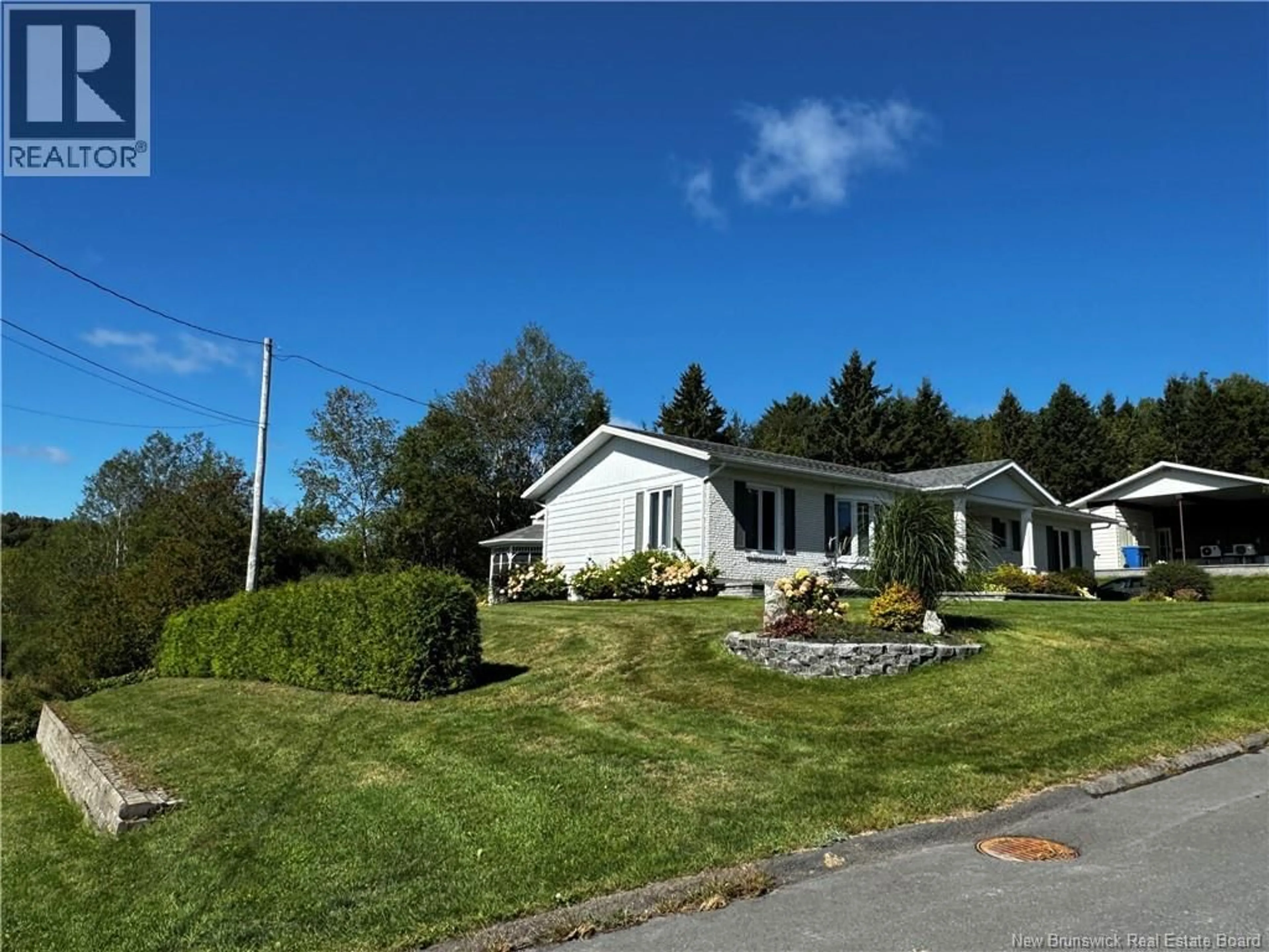 A pic from outside/outdoor area/front of a property/back of a property/a pic from drone, unknown for 84 PHILIPPE AVENUE, Edmundston New Brunswick E3V1R1