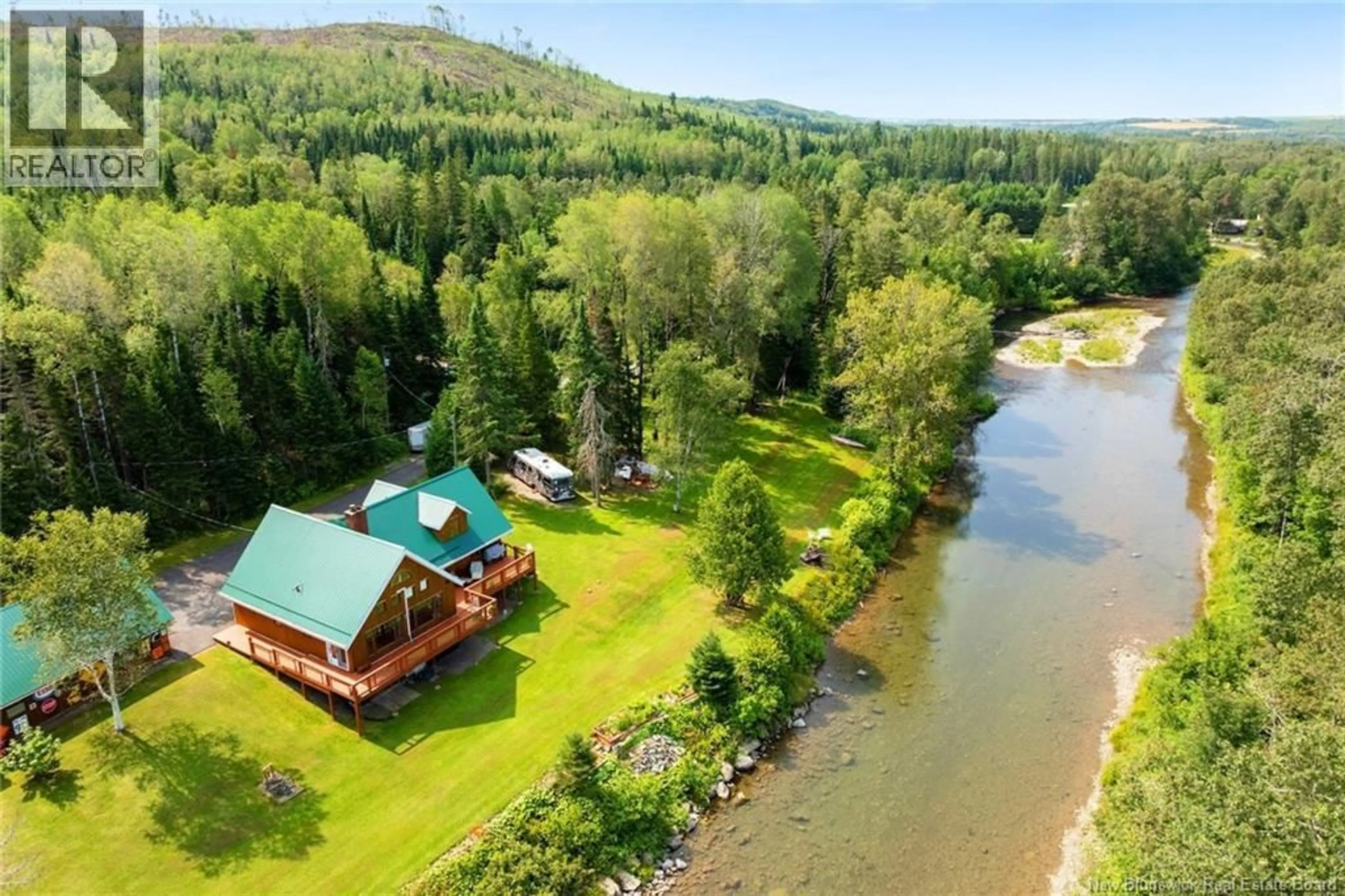 A pic from outside/outdoor area/front of a property/back of a property/a pic from drone, water/lake/river/ocean view for 315 BOGAN BROOK ROAD, New Denmark New Brunswick E7G1E1