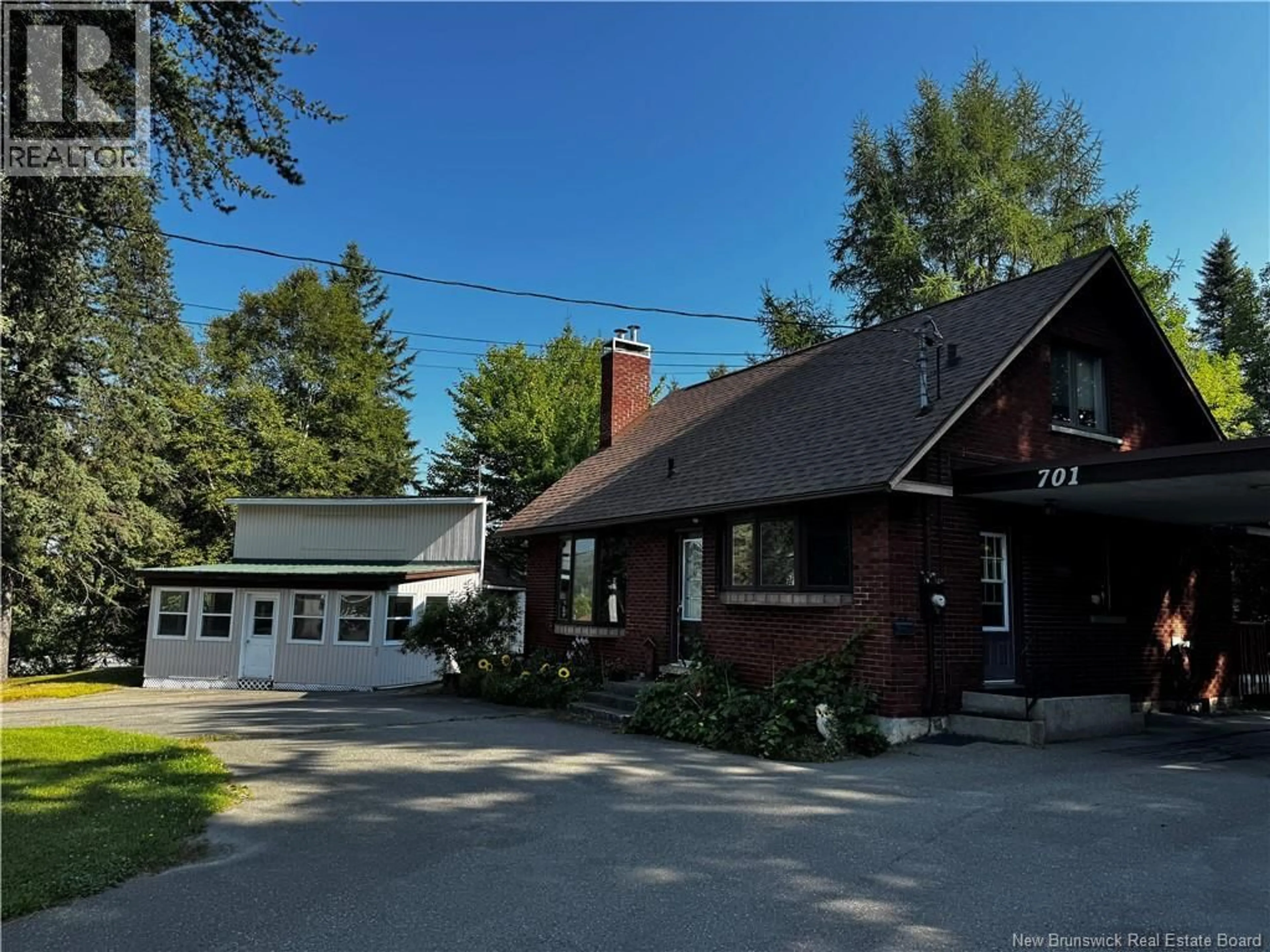A pic from outside/outdoor area/front of a property/back of a property/a pic from drone, street for 701 VICTORIA STREET, Edmundston New Brunswick E3V3T3
