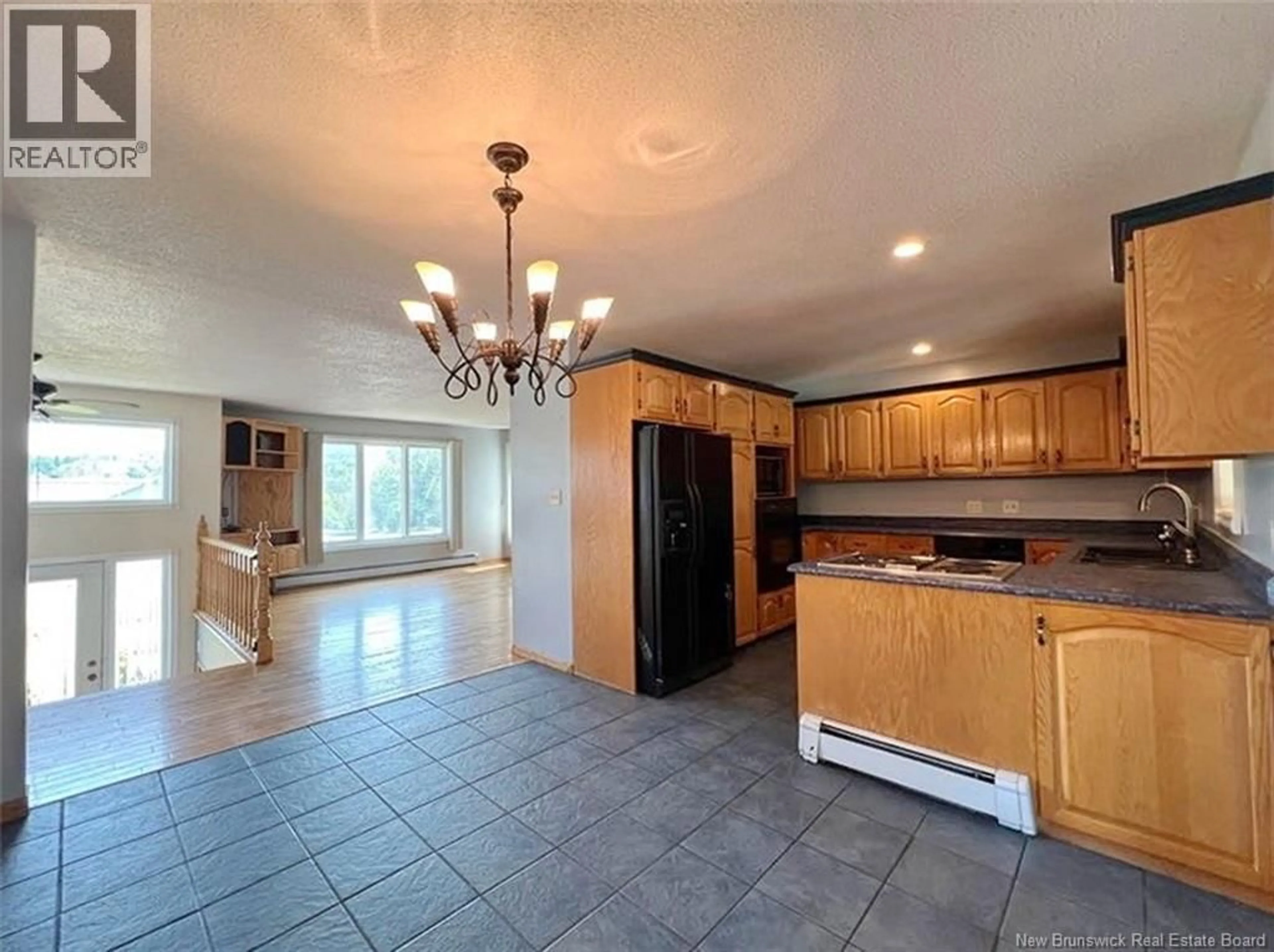 Open concept kitchen, ceramic/tile floor for 1169 ST-FRANCOIS STREET, Edmundston New Brunswick E3V4P5