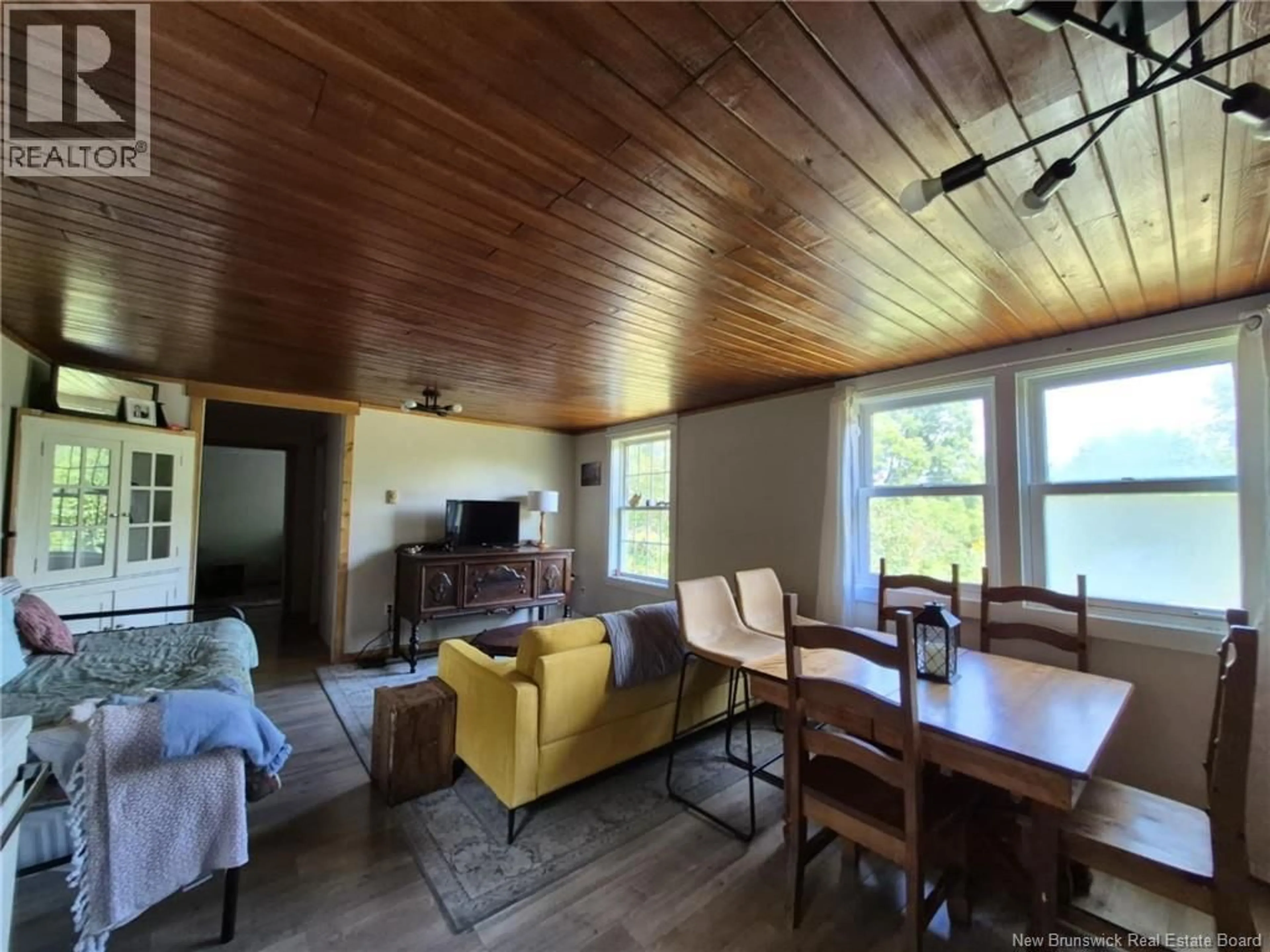 Living room with furniture, wood/laminate floor for 63 BURNT HILL ROAD, Burnt Hill New Brunswick E3L5T5