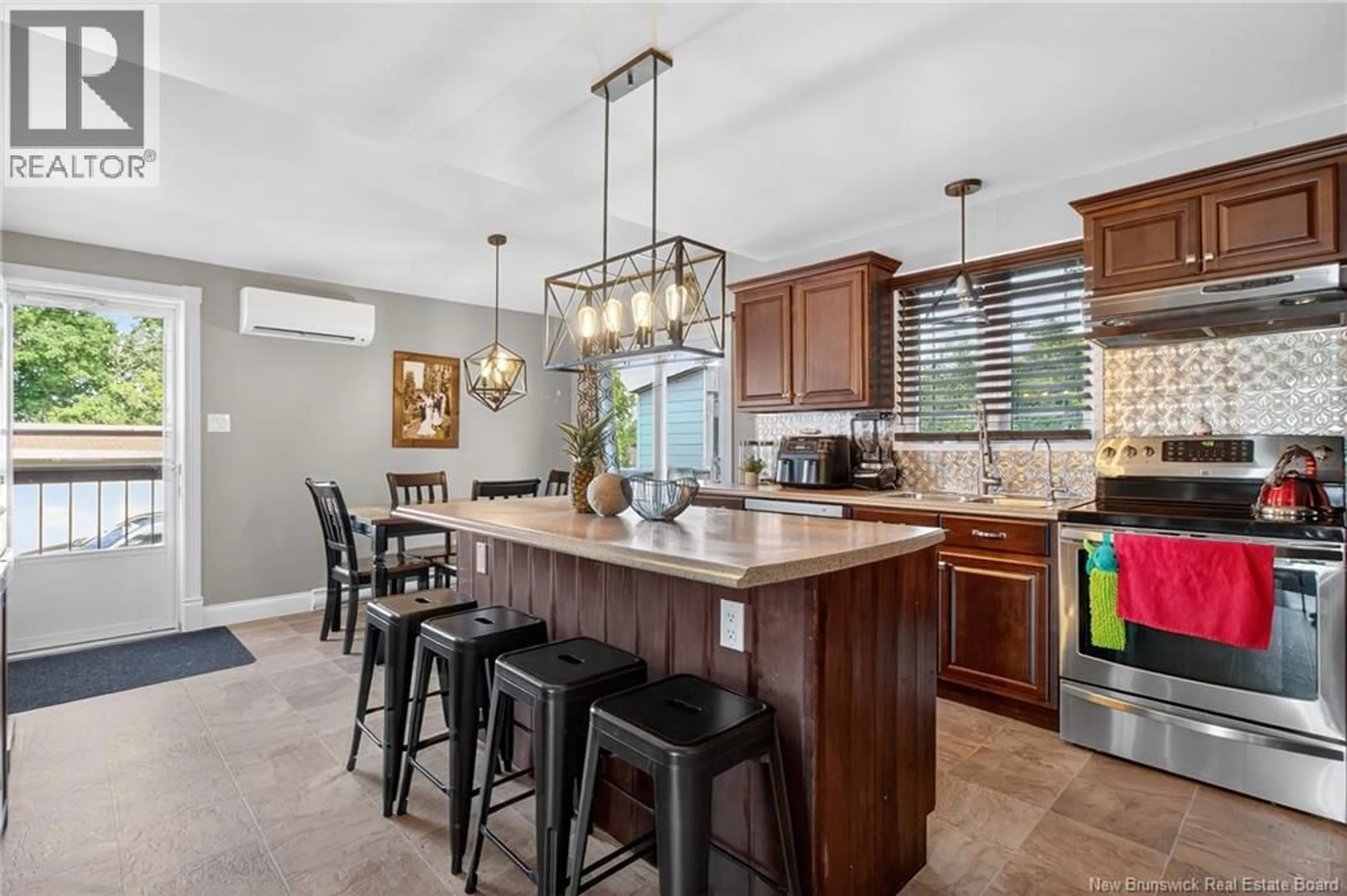 Open concept kitchen, ceramic/tile floor for 104 ARTHUR STREET, Memramcook New Brunswick E4K1Z8