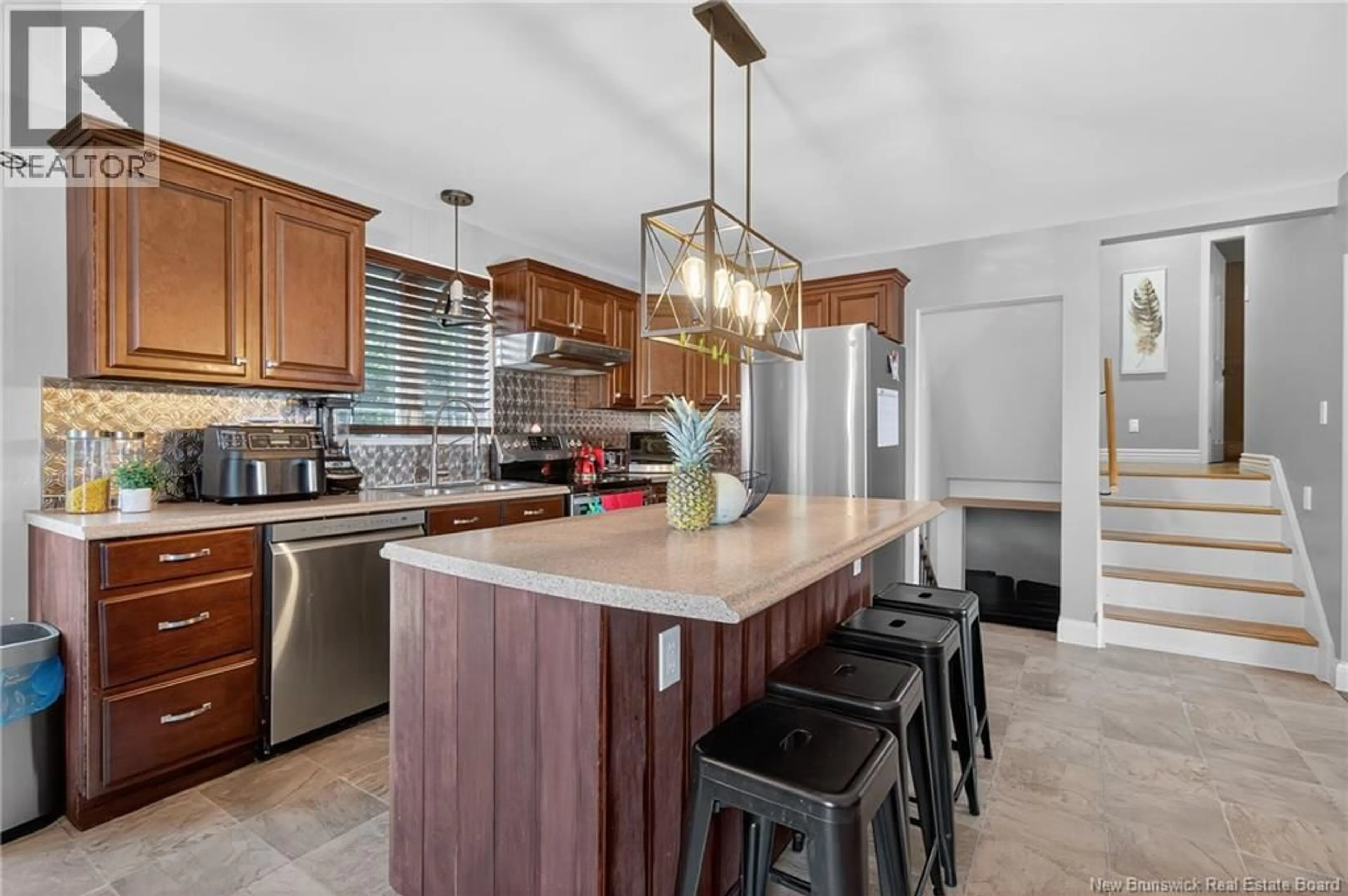 Open concept kitchen, ceramic/tile floor for 104 ARTHUR STREET, Memramcook New Brunswick E4K1Z8