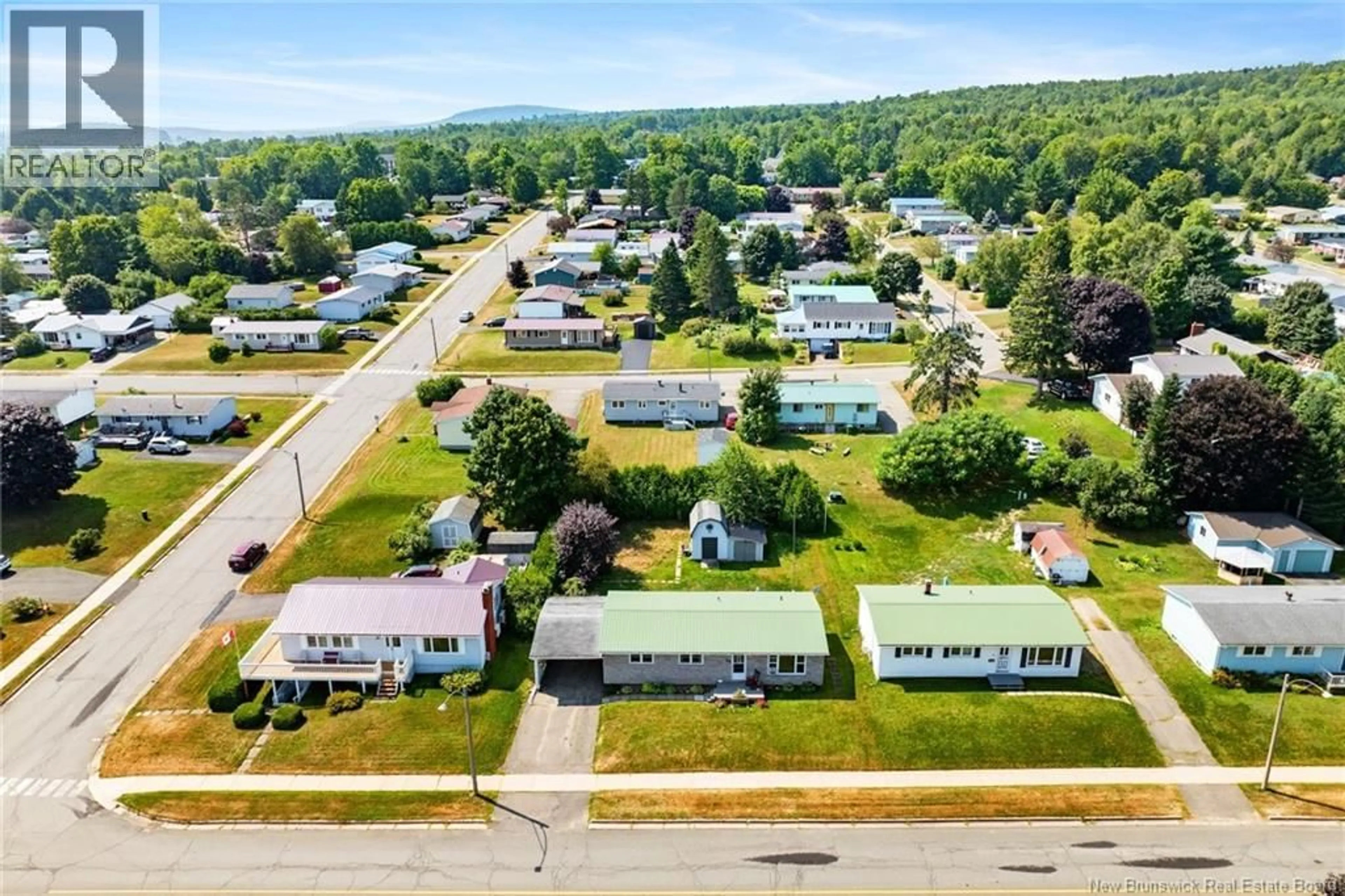 A pic from outside/outdoor area/front of a property/back of a property/a pic from drone, street for 59 OTIS DRIVE, Nackawic New Brunswick E6G1G7