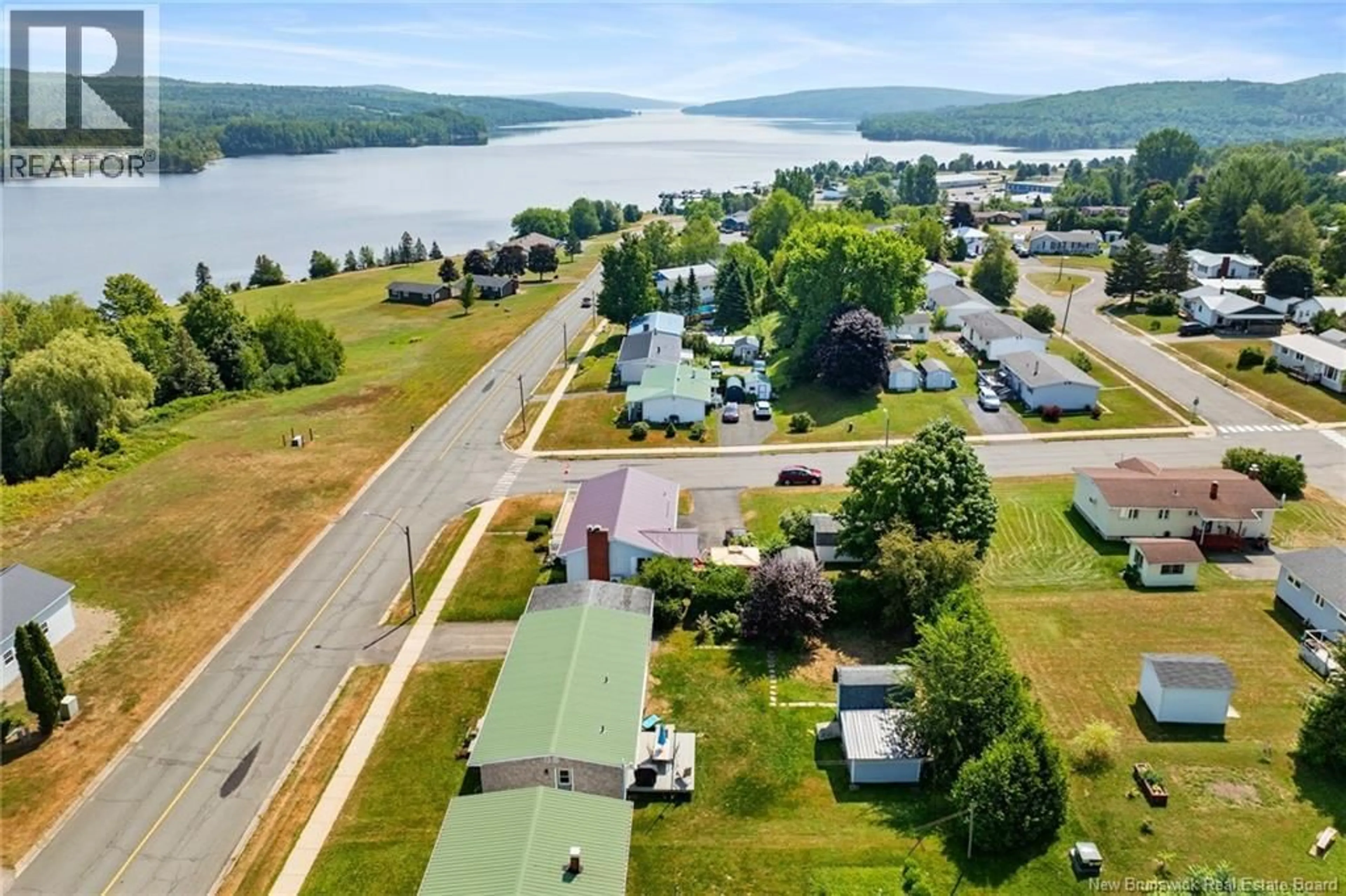 A pic from outside/outdoor area/front of a property/back of a property/a pic from drone, water/lake/river/ocean view for 59 OTIS DRIVE, Nackawic New Brunswick E6G1G7