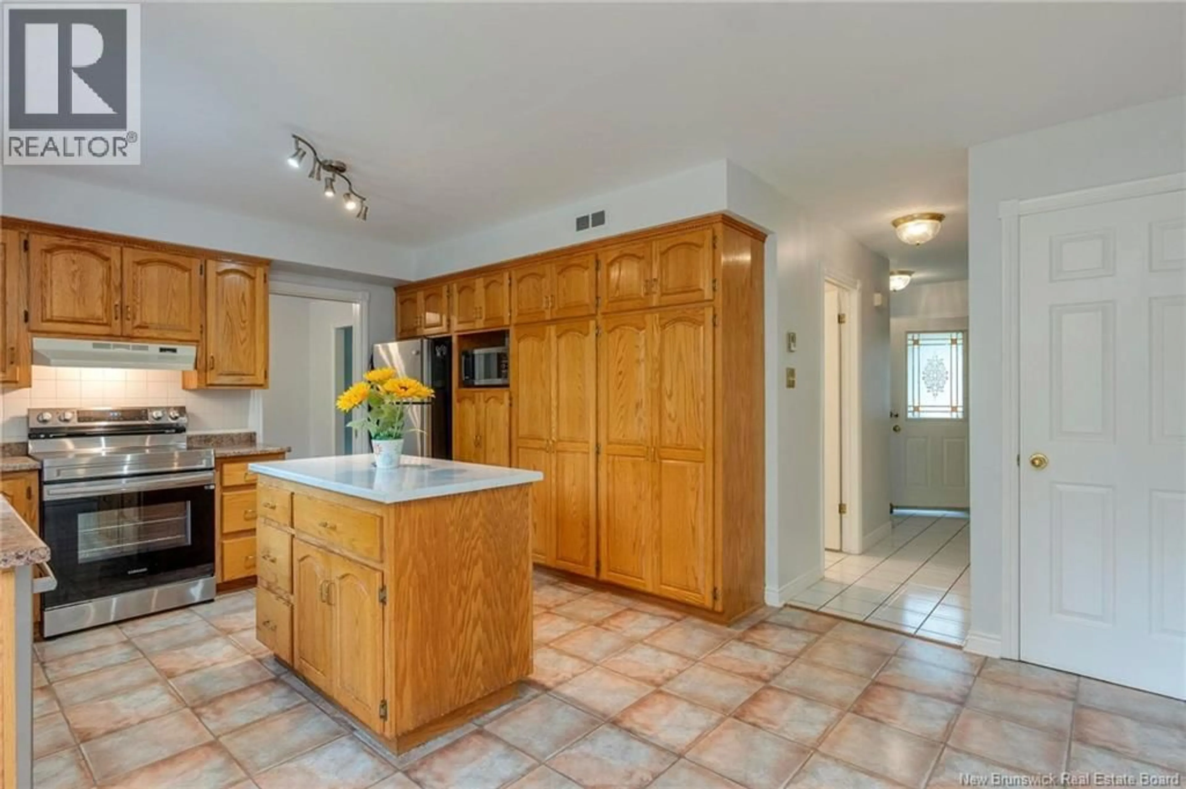 Open concept kitchen, ceramic/tile floor for 35 ROBINSON, Rothesay New Brunswick E2E4X4