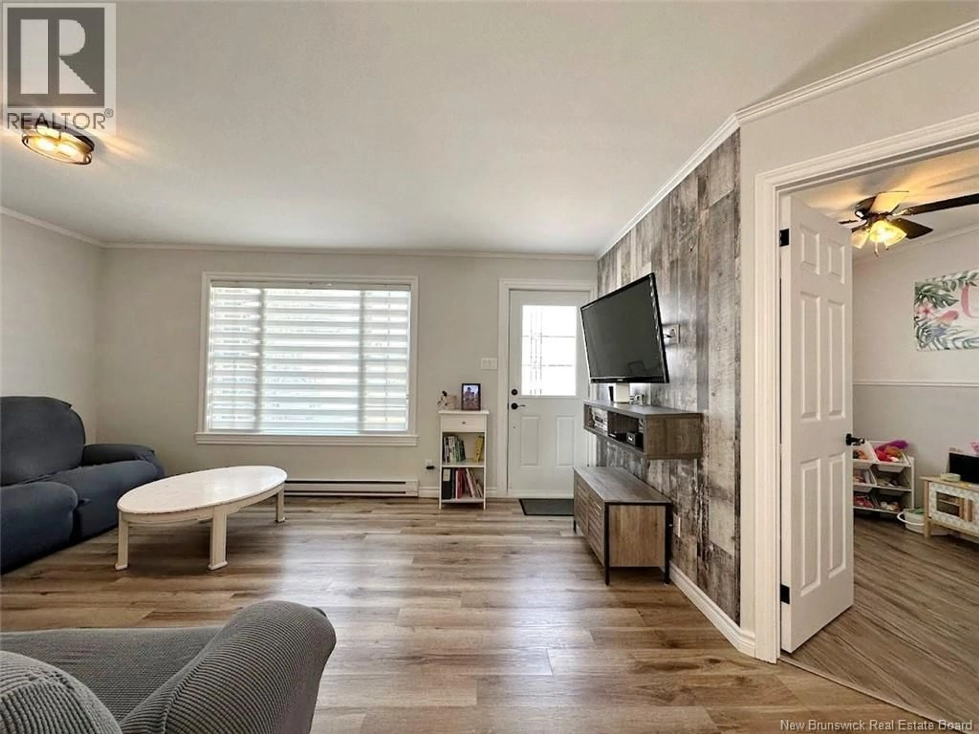Living room with furniture, wood/laminate floor for 25 DES SOEURS STREET, Saint-Jacques New Brunswick E7B1G5