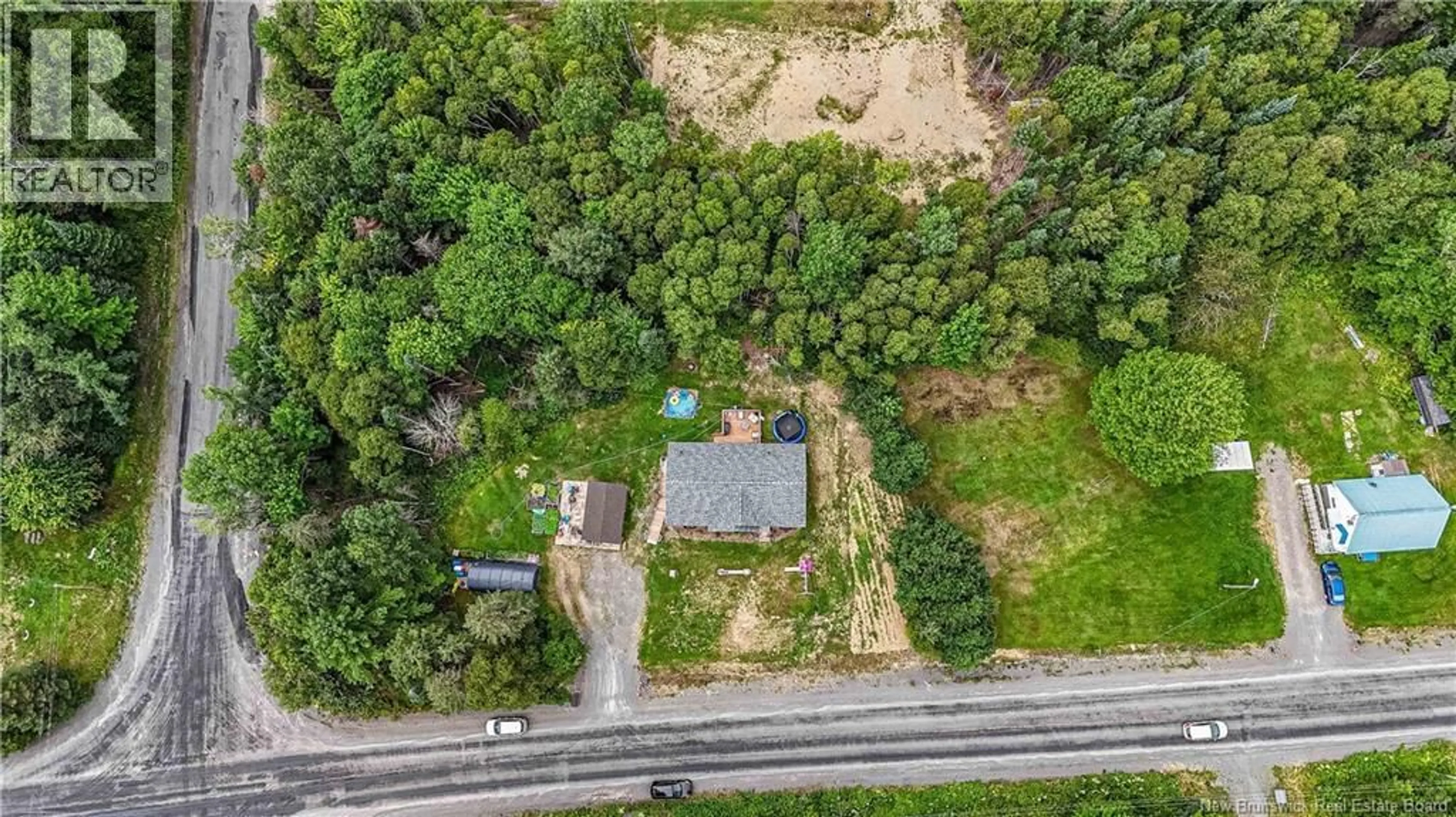 A pic from outside/outdoor area/front of a property/back of a property/a pic from drone, street for 1071 ROUTE 628, Taymouth New Brunswick E6C2B6