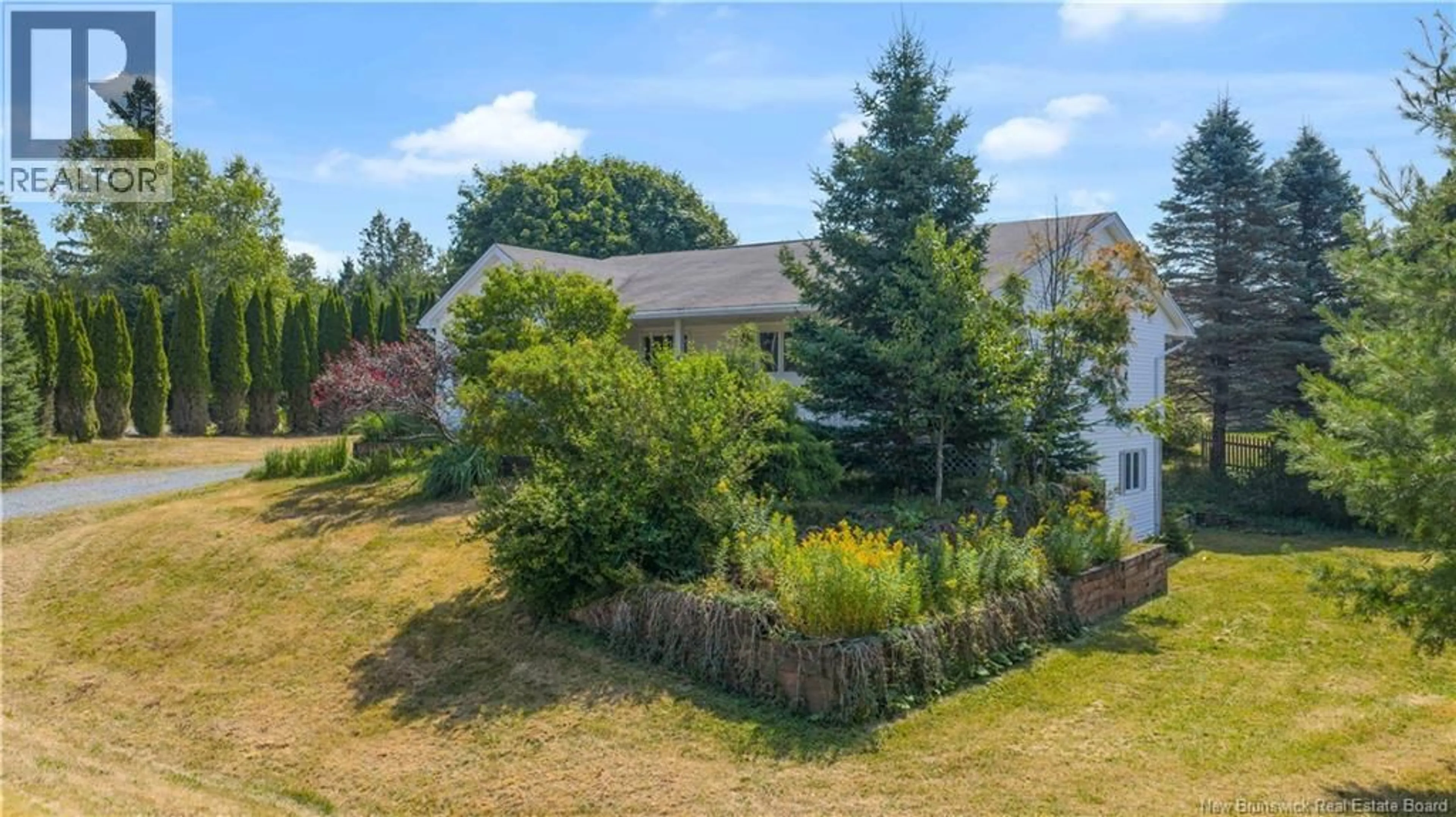 A pic from outside/outdoor area/front of a property/back of a property/a pic from drone, water/lake/river/ocean view for 14 PINEWOOD CRESCENT, Quispamsis New Brunswick E2E4Y9