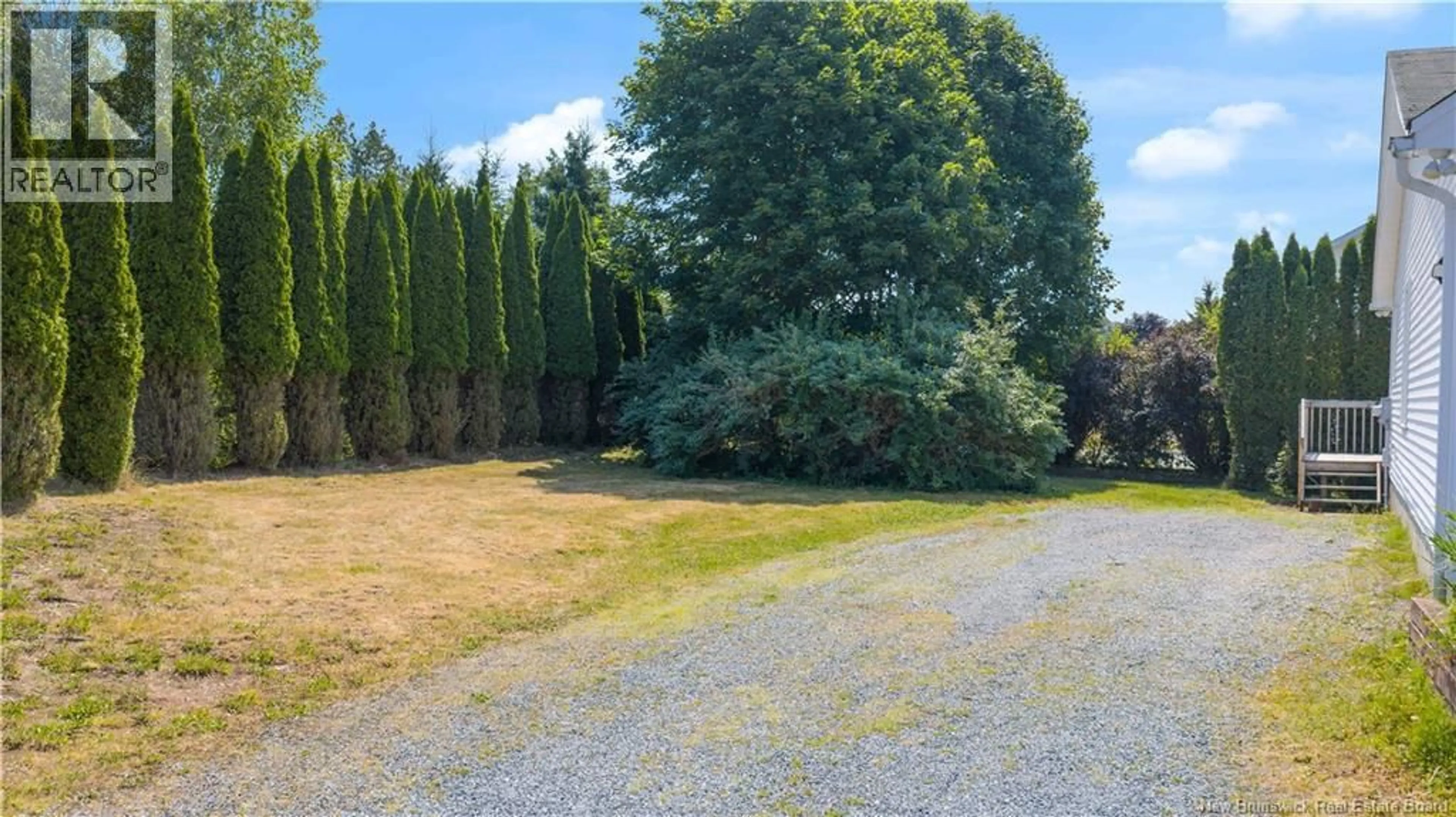 A pic from outside/outdoor area/front of a property/back of a property/a pic from drone, forest/trees view for 14 PINEWOOD CRESCENT, Quispamsis New Brunswick E2E4Y9