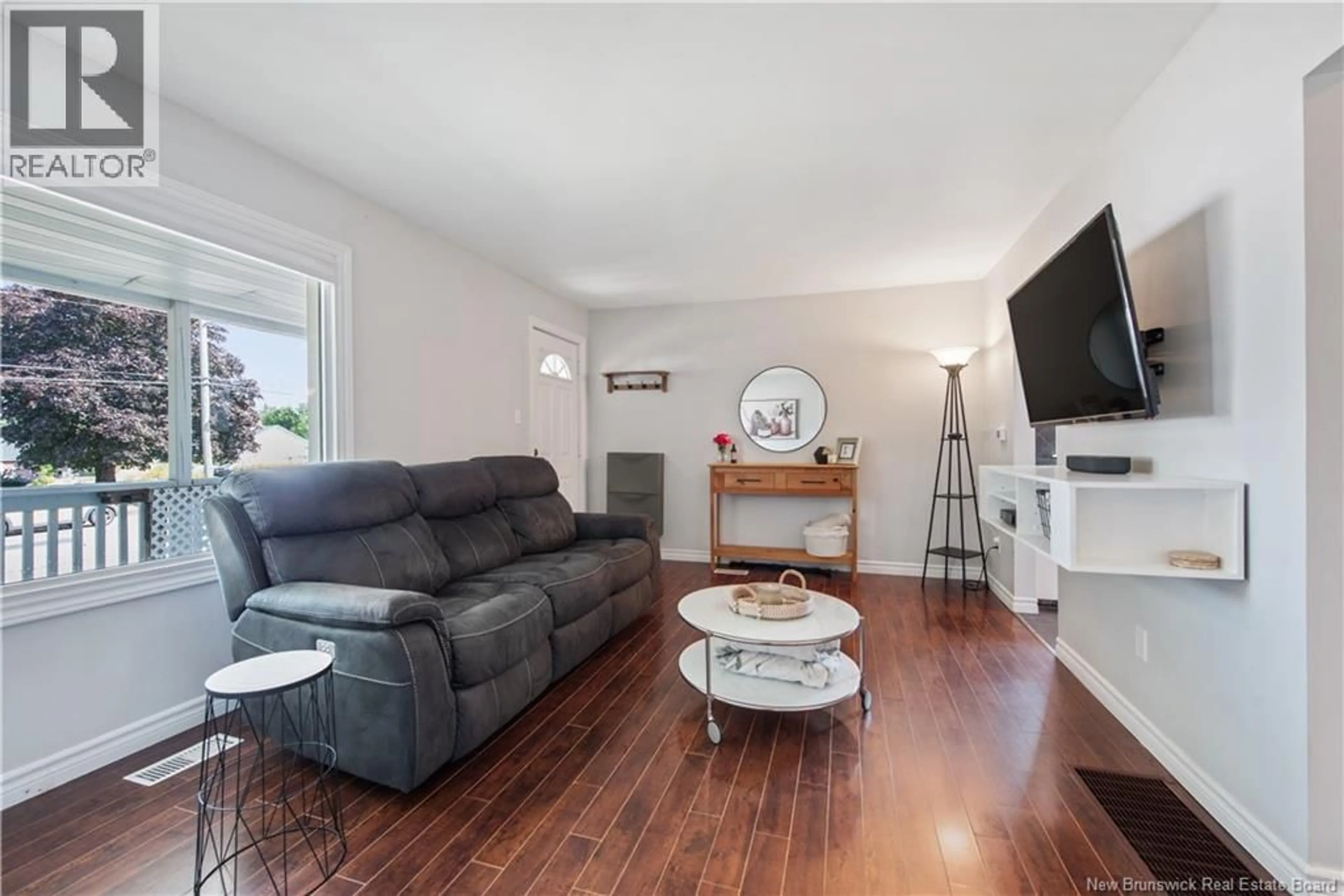 Living room with furniture, wood/laminate floor for 160 JONES STREET, Moncton New Brunswick E1C6J6