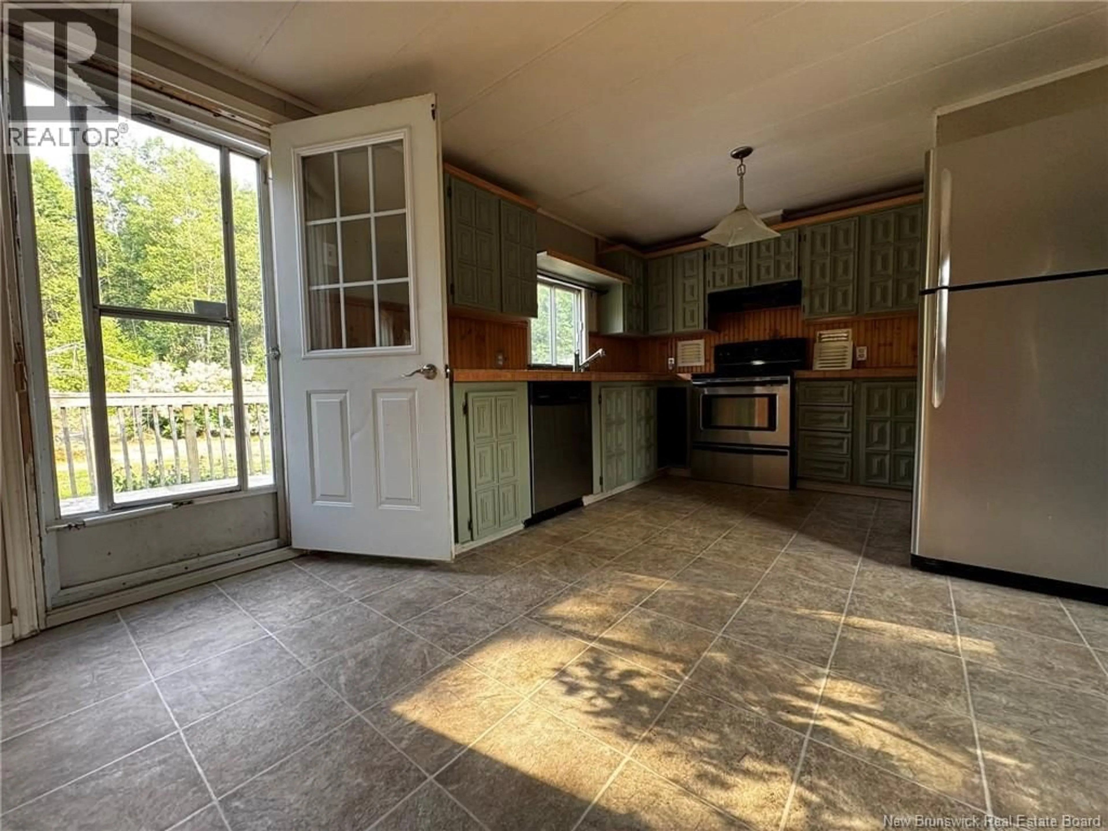 Open concept kitchen, ceramic/tile floor for 12454 HWY 126, Murray Settlement New Brunswick E4Y2S4