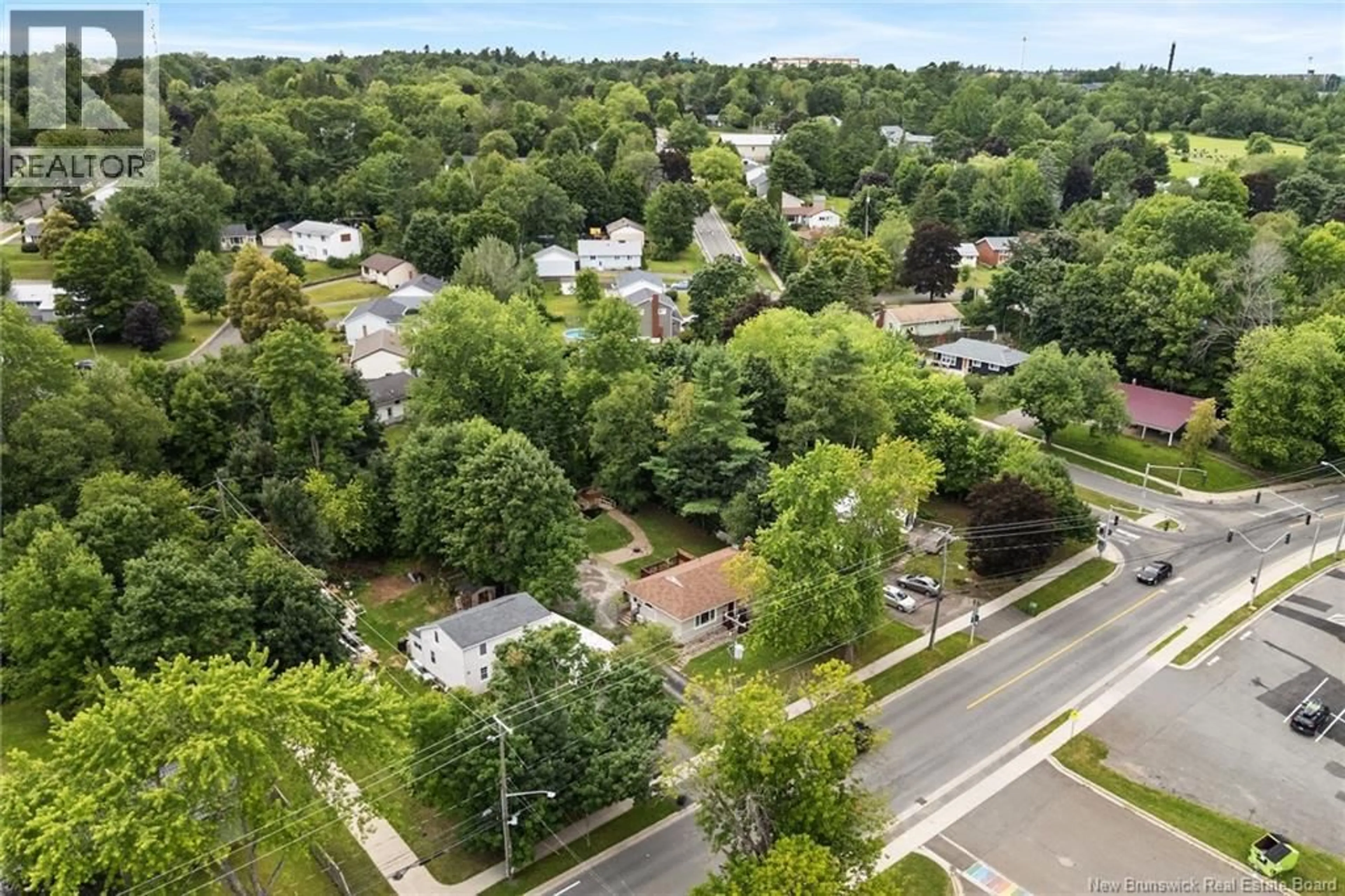 A pic from outside/outdoor area/front of a property/back of a property/a pic from drone, street for 531 FOREST HILL ROAD, Fredericton New Brunswick E3B4K5