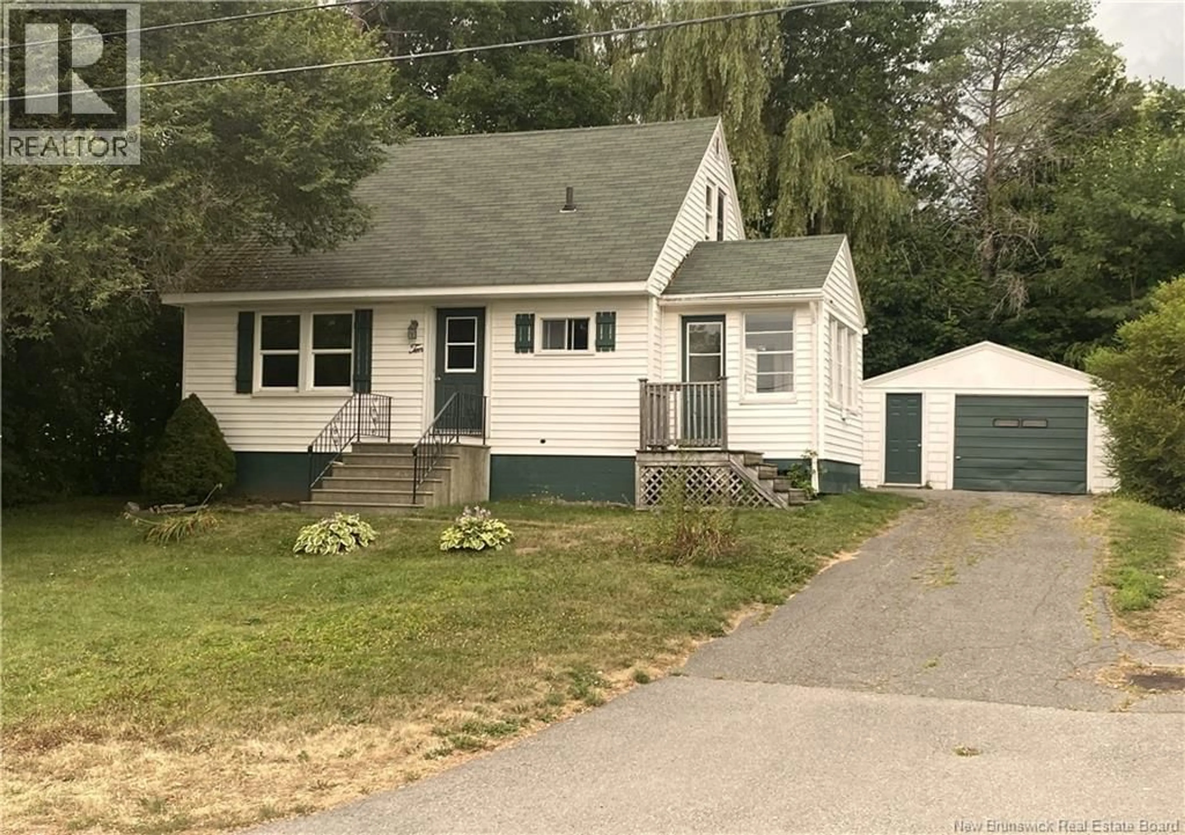 Home with vinyl exterior material, street for 10 THOMPSON AVENUE, St. Stephen New Brunswick E3L5G1