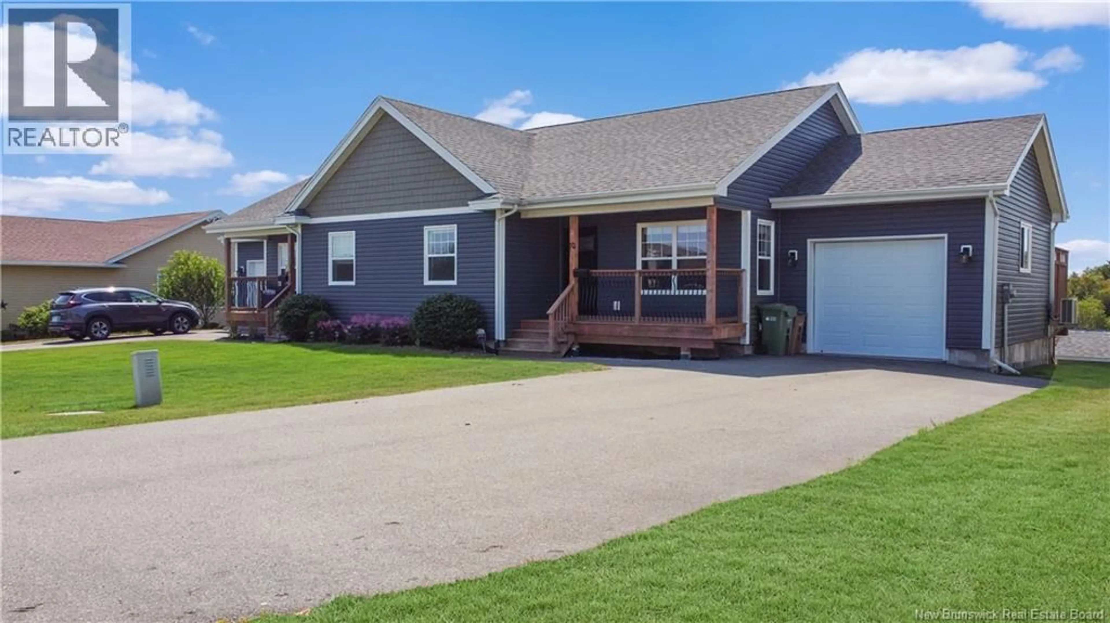 Home with vinyl exterior material, street for 10 LAKEFIELD COURT, Saint John New Brunswick E2J5B3