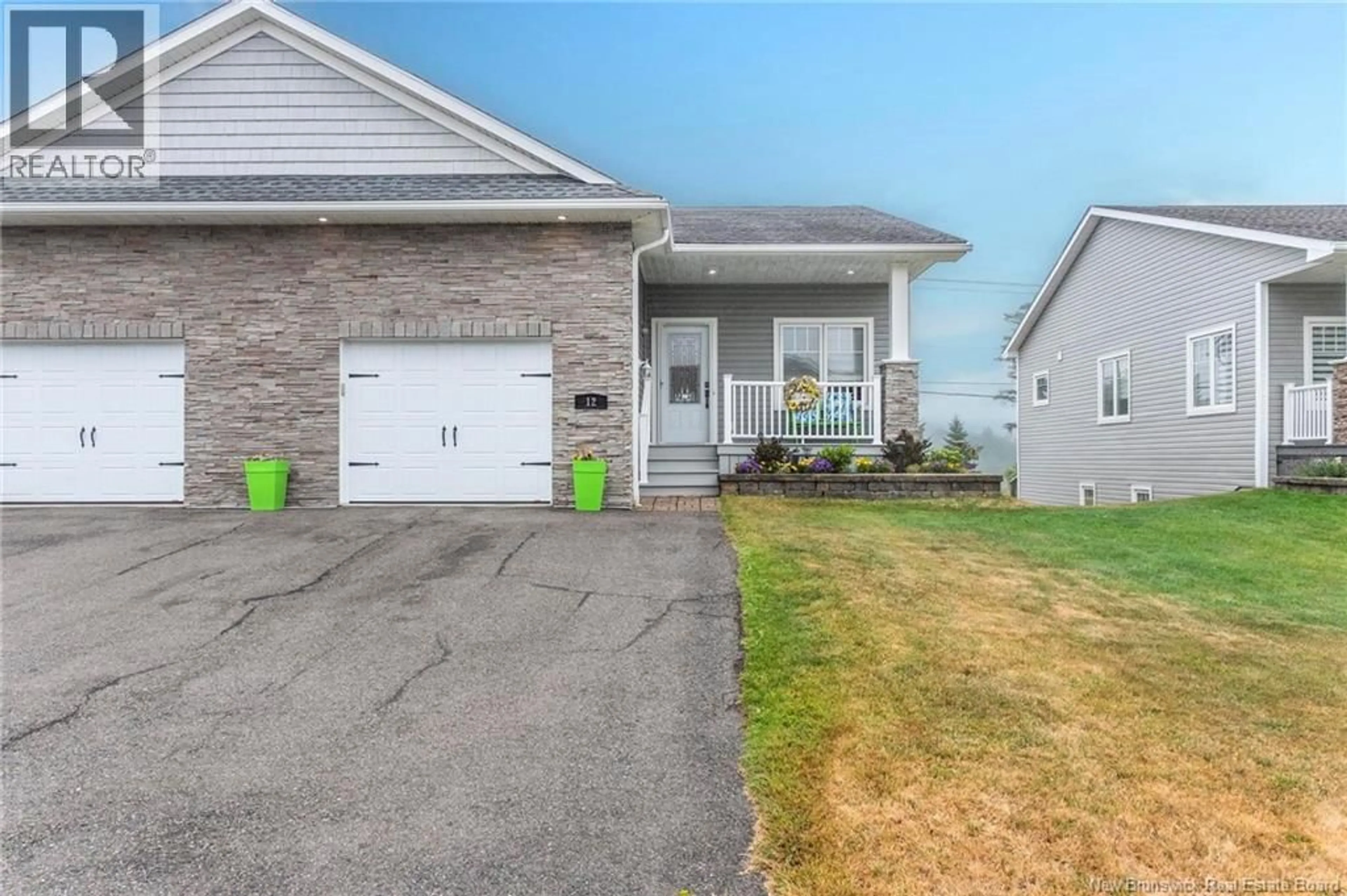 Home with vinyl exterior material, street for 12 HITACHI CRESCENT, Saint John New Brunswick E2M0G4