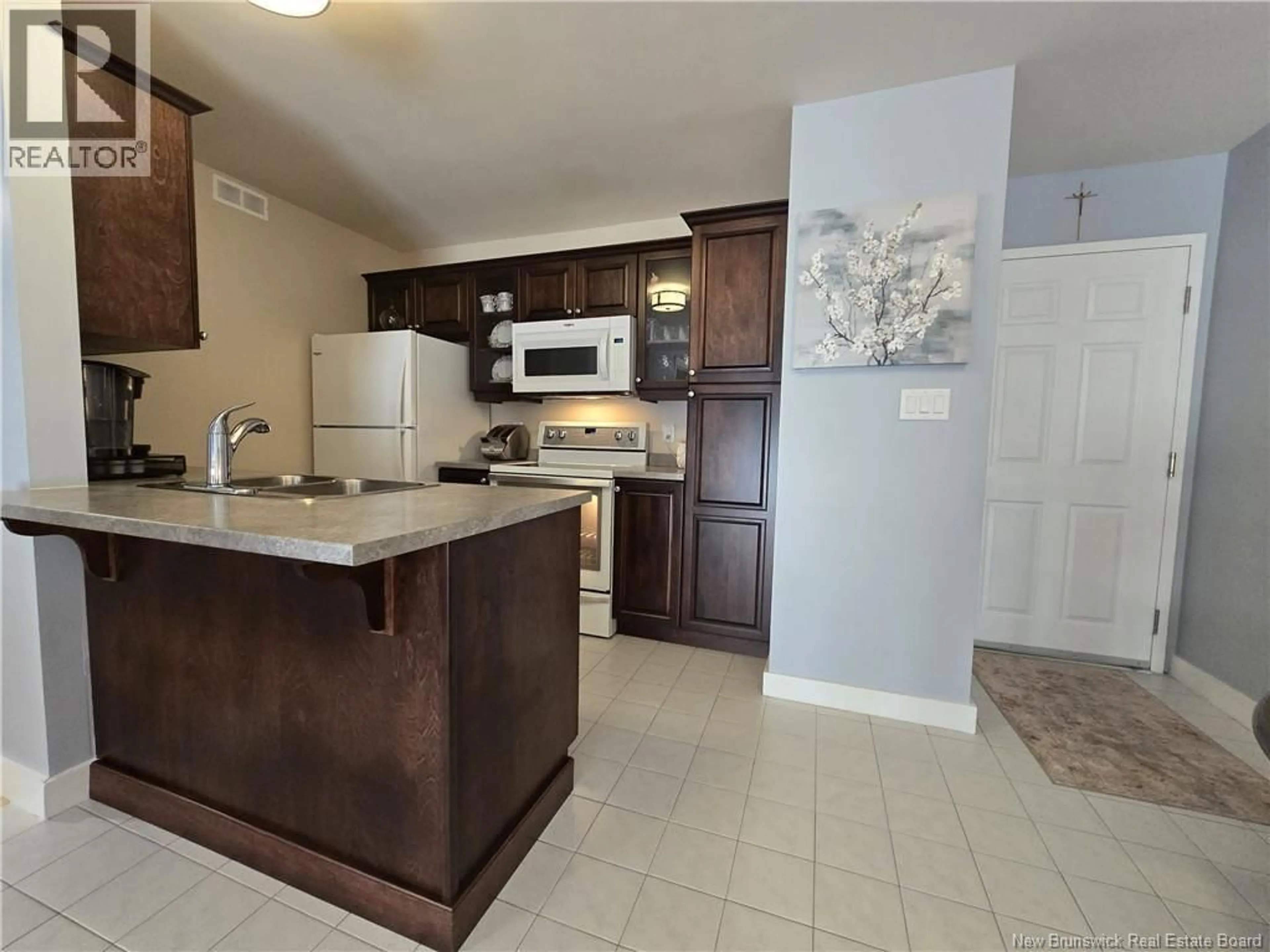 Open concept kitchen, ceramic/tile floor for 41 - 33 MACALEESE LANE, Moncton New Brunswick E1A3M1