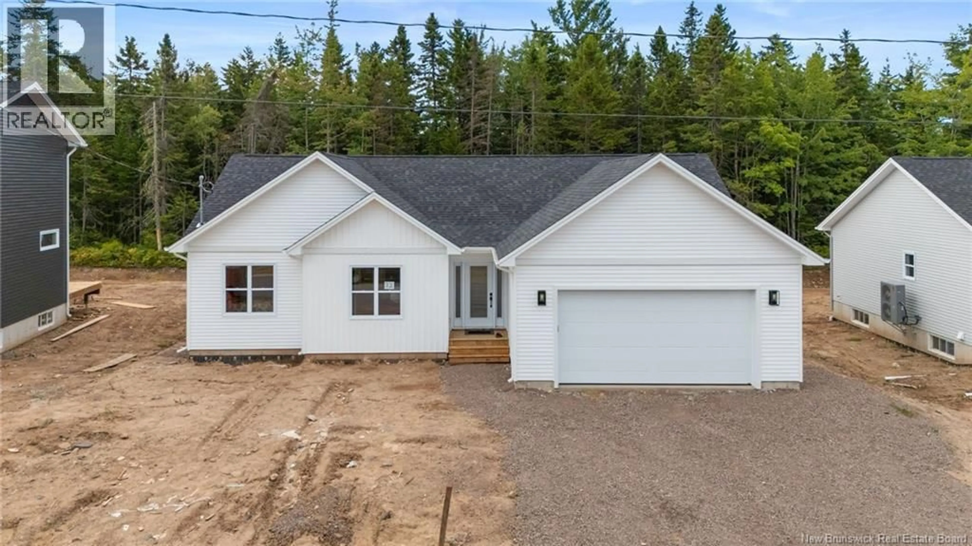 Home with vinyl exterior material, street for 32 CARTER STREET, Dieppe New Brunswick E1A0G4