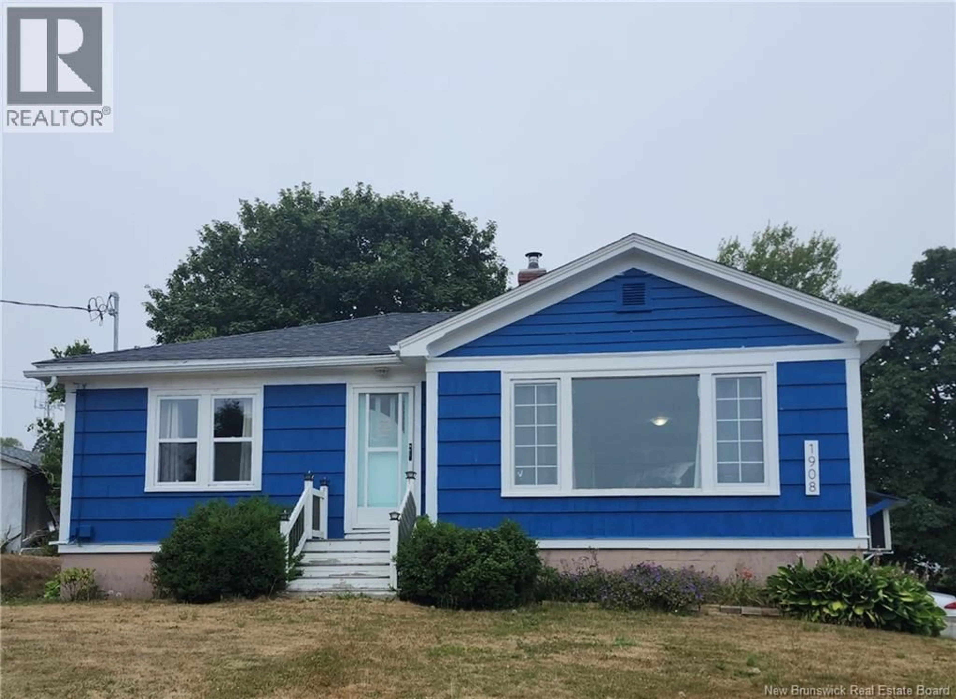 Home with vinyl exterior material, street for 1908 RTE 776 ROUTE, Grand Manan New Brunswick E5G3H2