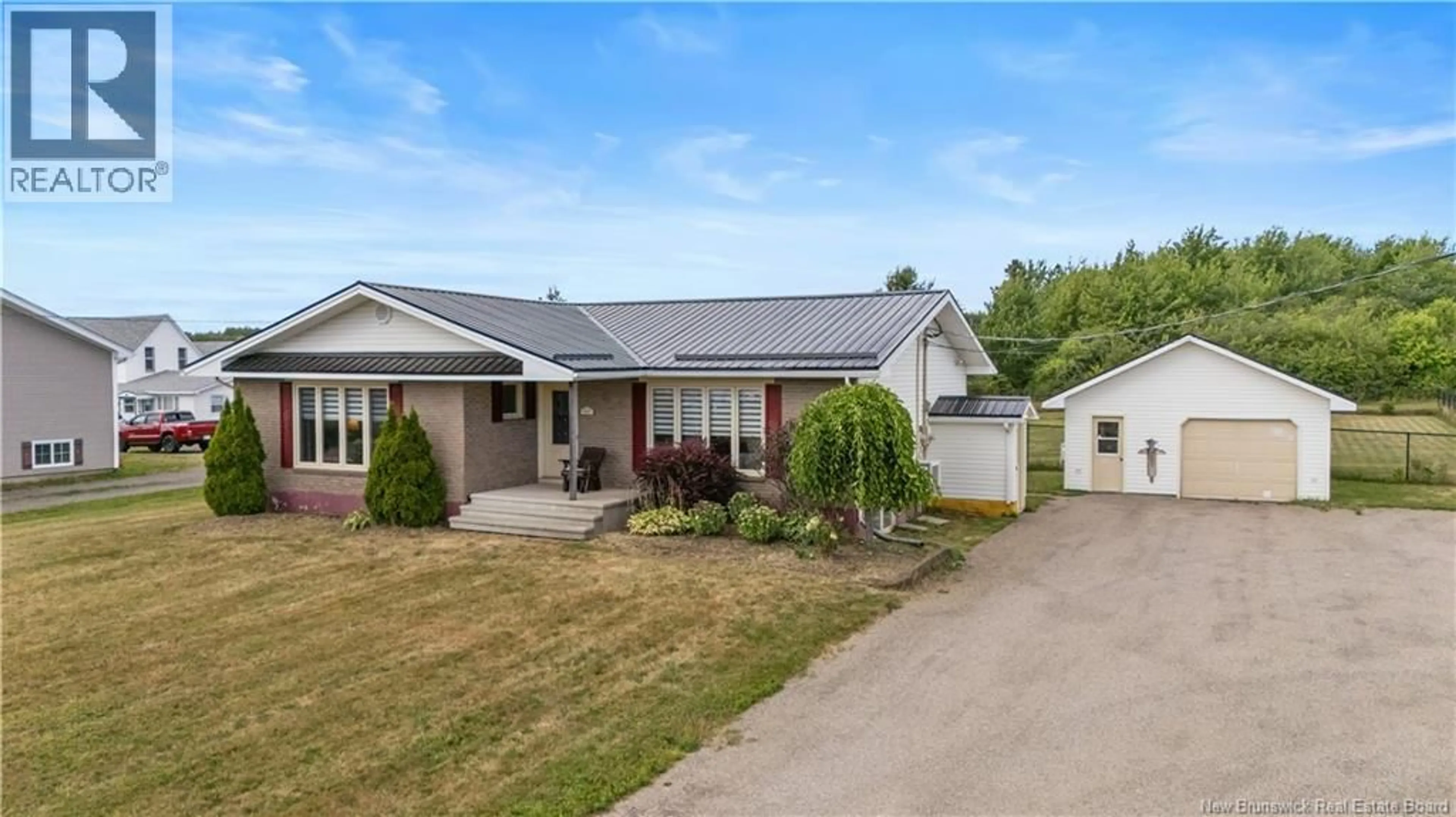Home with vinyl exterior material, street for 227 IRVING BOULEVARD, Bouctouche New Brunswick E4S3K5