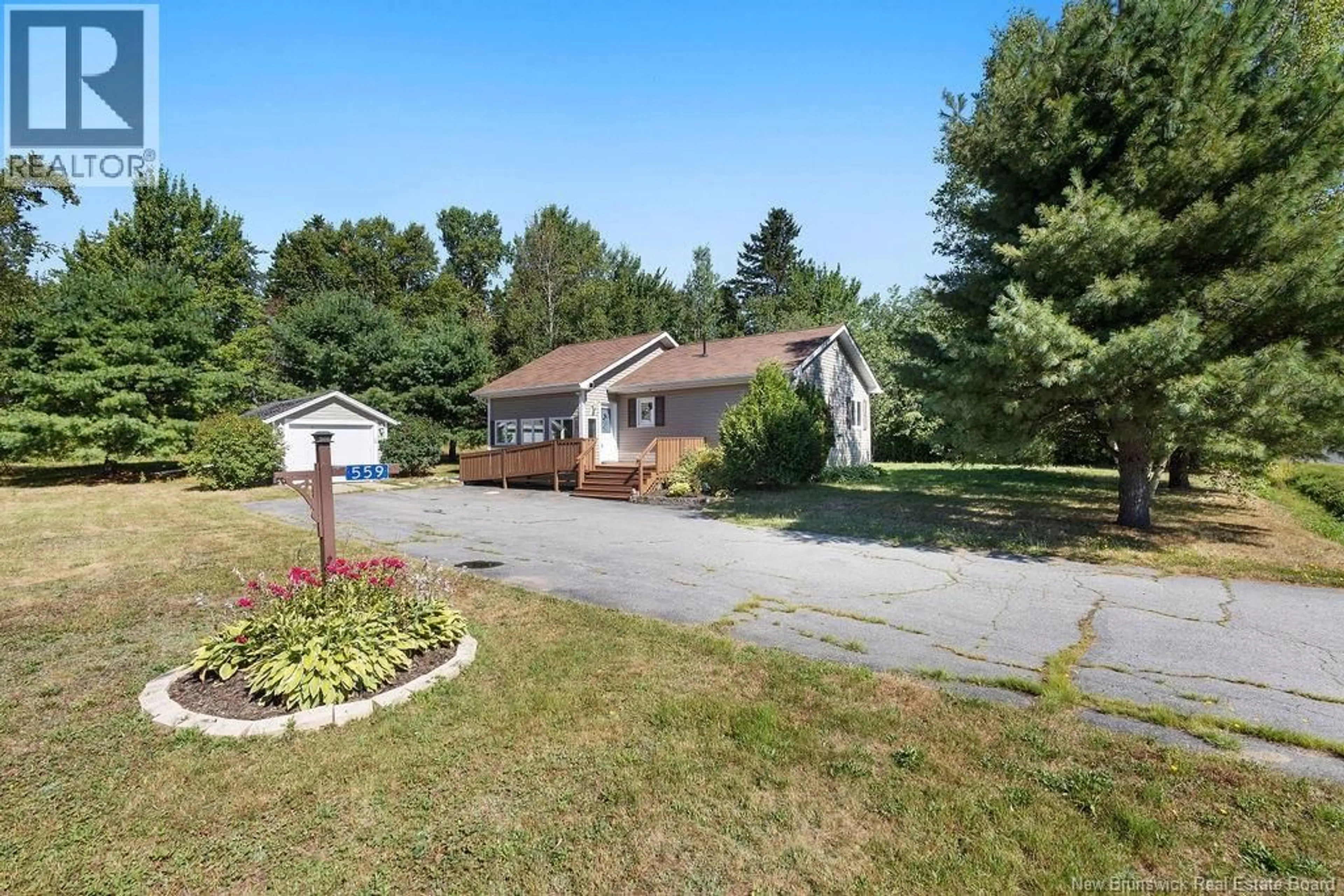 A pic from outside/outdoor area/front of a property/back of a property/a pic from drone, unknown for 559 BEAVERBROOK ROAD, Miramichi New Brunswick E1V4R4