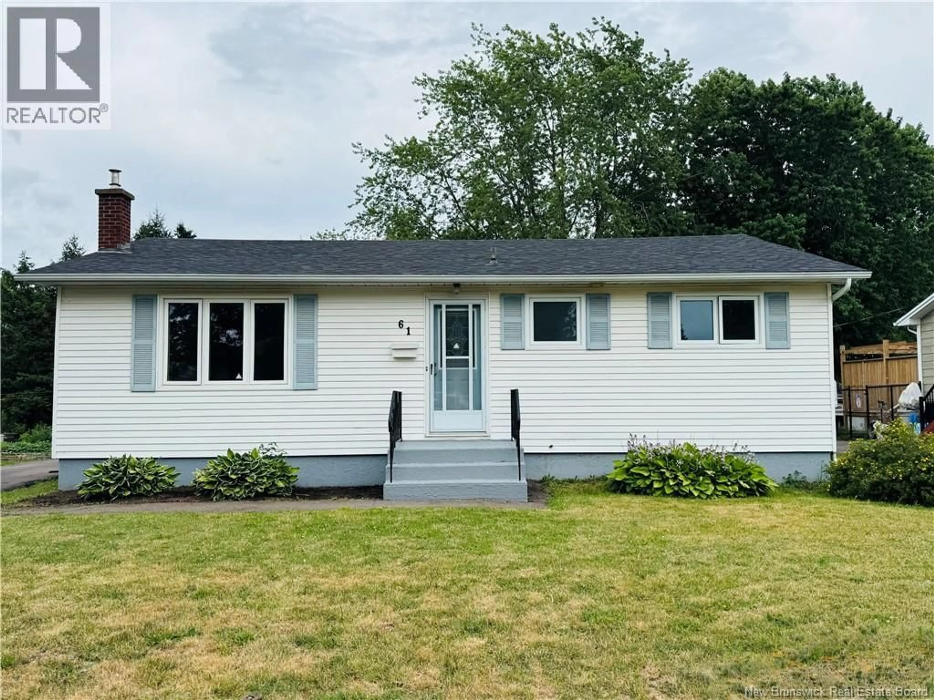 Home with vinyl exterior material, street for 61 ROYAL ROAD, Moncton New Brunswick E1A4S8
