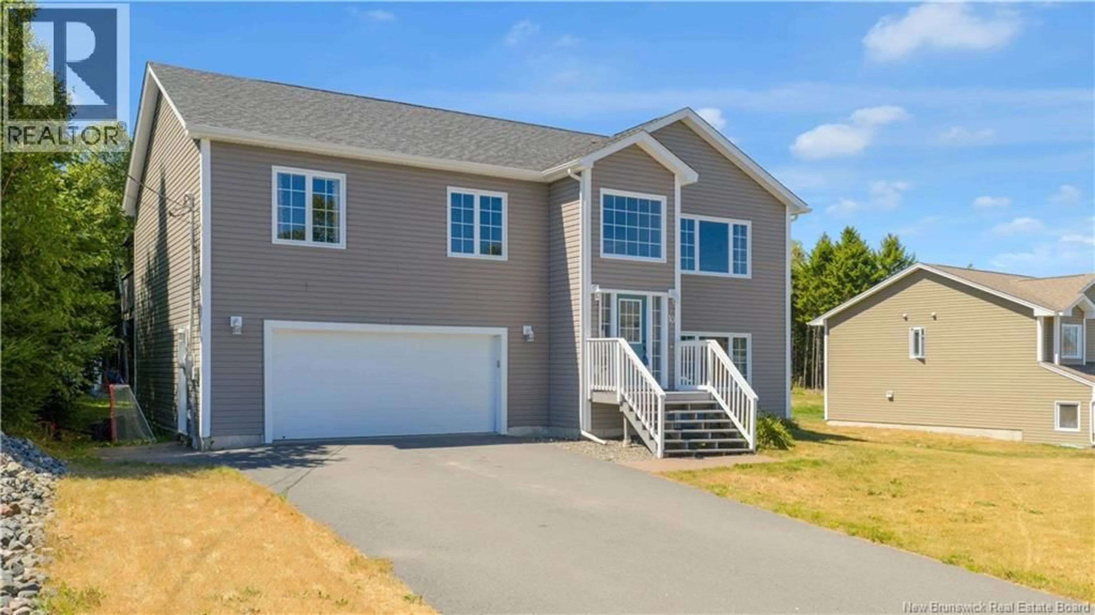 Home with vinyl exterior material, street for 10 MAPLECREST DRIVE, Grand Bay-Westfield New Brunswick E5K0B9