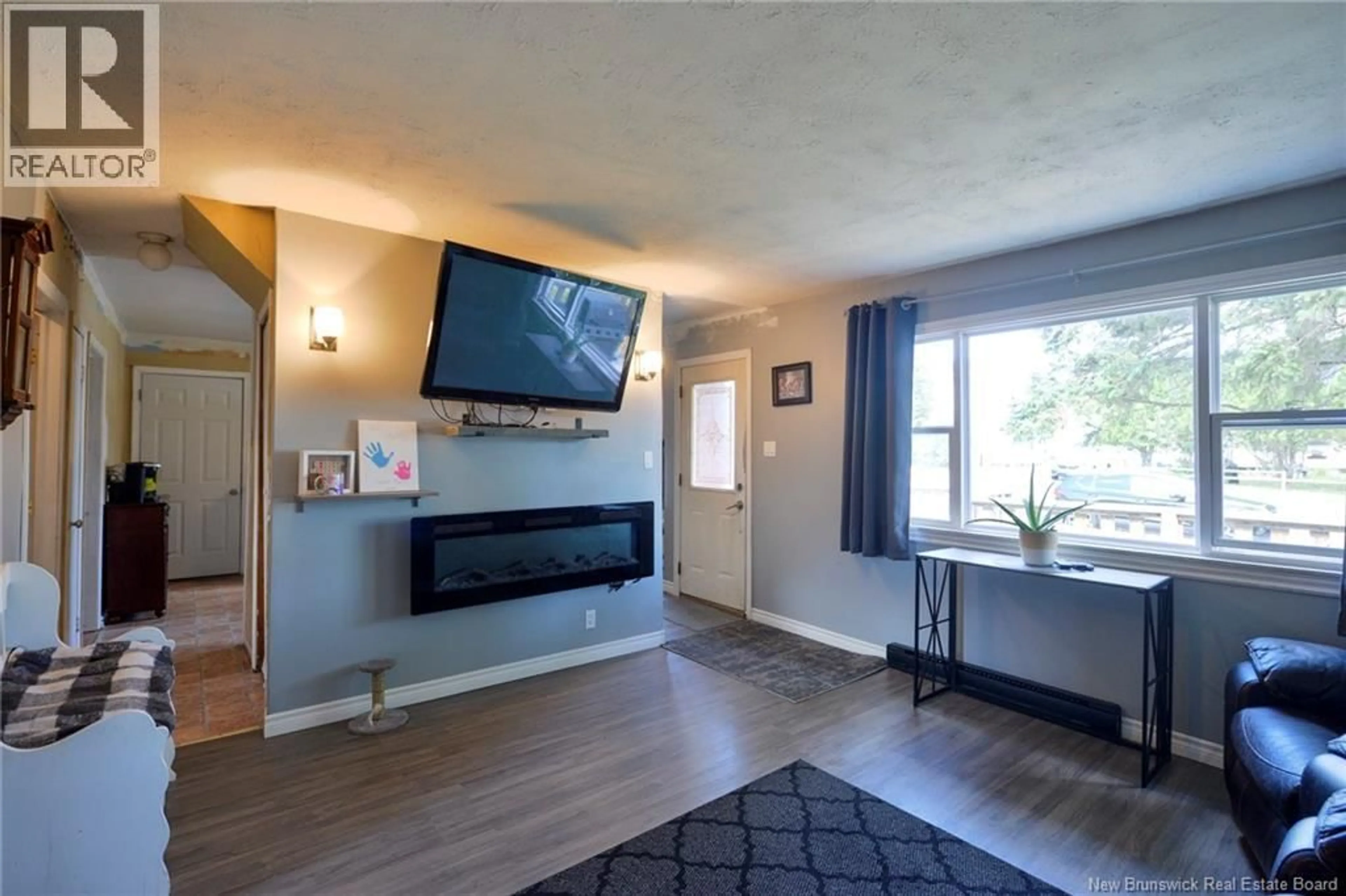 Living room with furniture, wood/laminate floor for 88 BROADWAY AVENUE, Saint John New Brunswick E2H1Z8