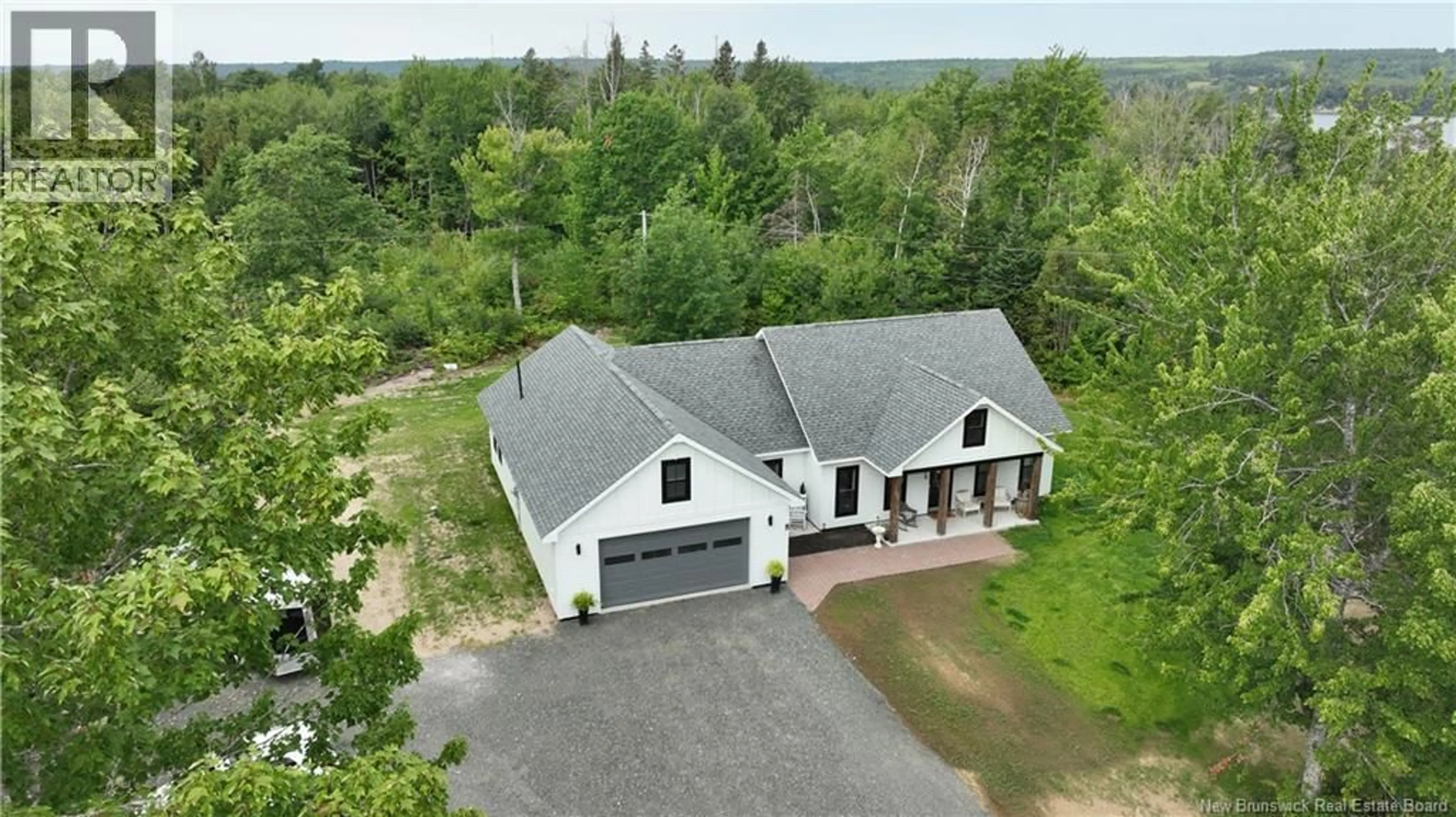A pic from outside/outdoor area/front of a property/back of a property/a pic from drone, building for 4 RIVERVIEW AVE, Miramichi New Brunswick E1N3J9