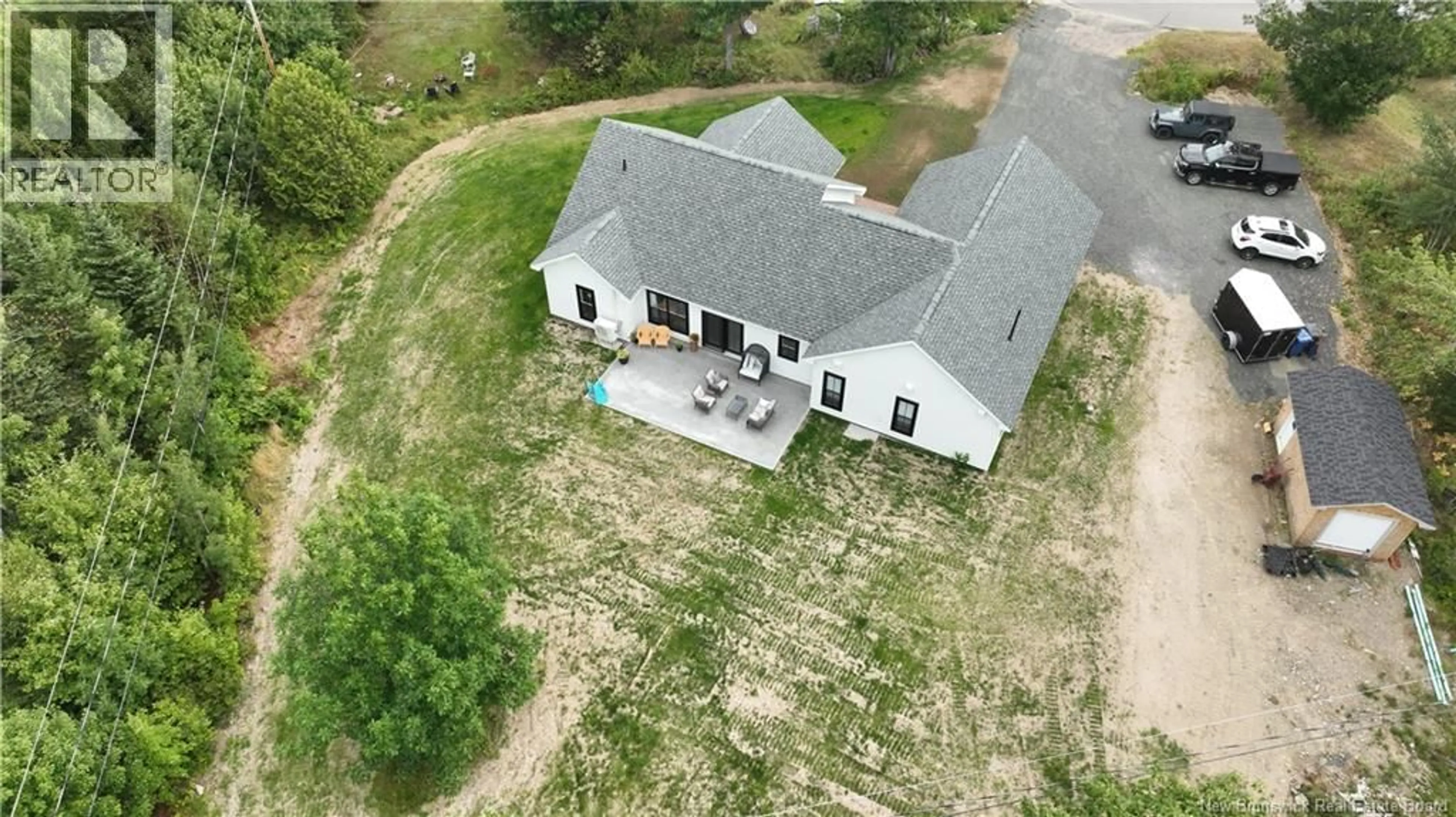 A pic from outside/outdoor area/front of a property/back of a property/a pic from drone, building for 4 RIVERVIEW AVE, Miramichi New Brunswick E1N3J9