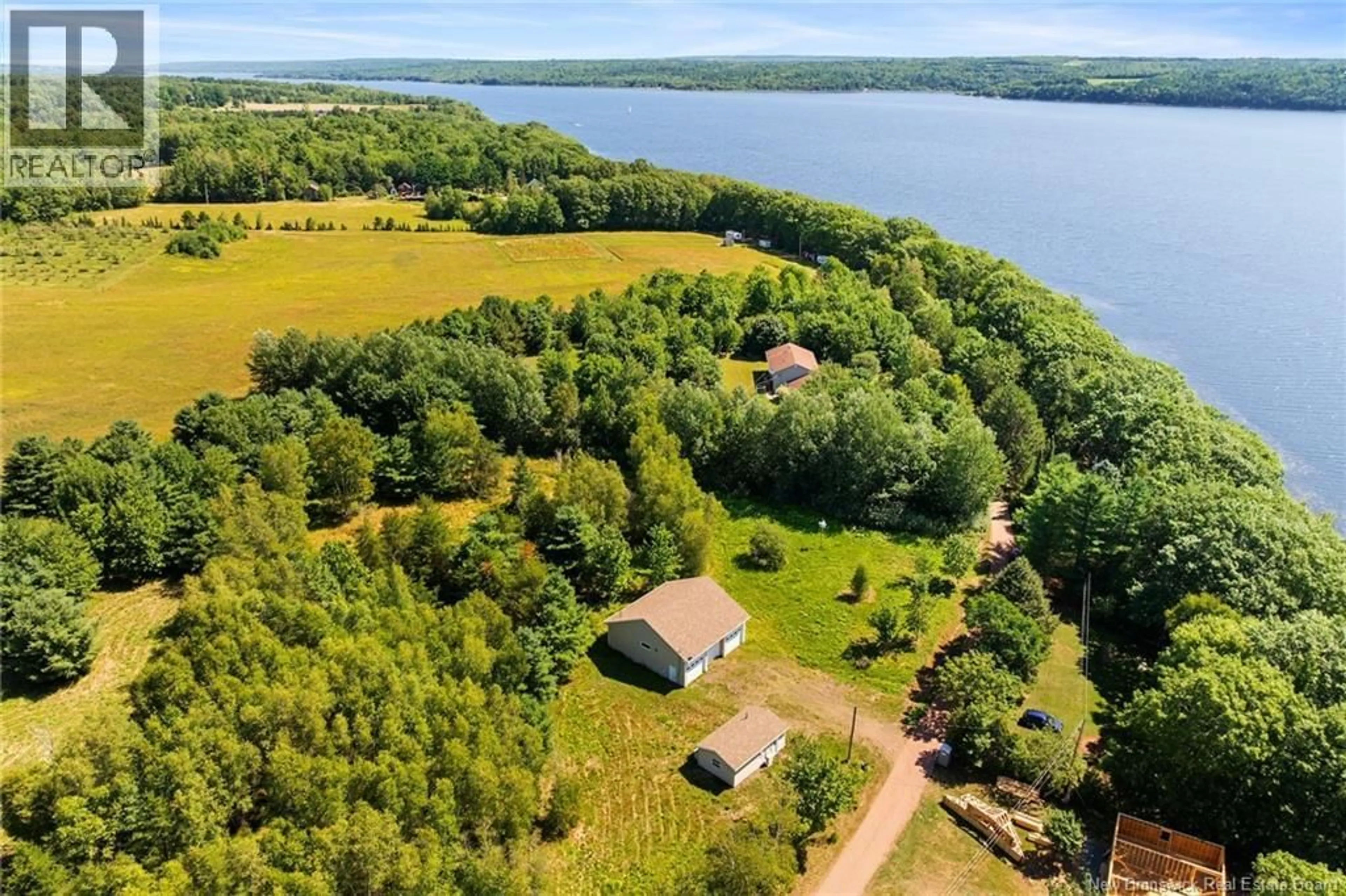 A pic from outside/outdoor area/front of a property/back of a property/a pic from drone, water/lake/river/ocean view for 34 WASHADEMOAK LANE, Cambridge-Narrows New Brunswick E4C4G7