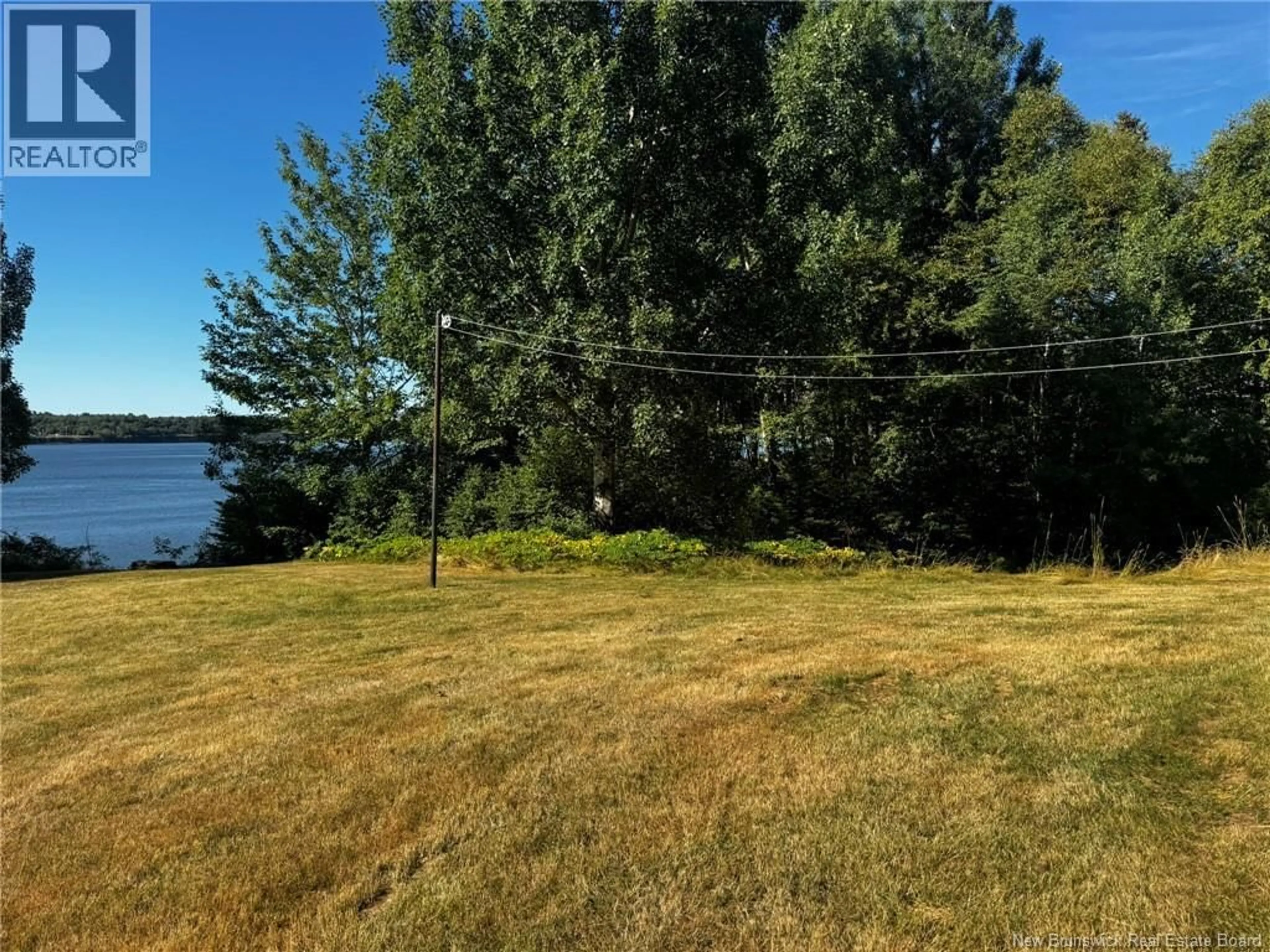 A pic from outside/outdoor area/front of a property/back of a property/a pic from drone, water/lake/river/ocean view for 352 HWY 11, Lower Newcastle New Brunswick E1V7G1