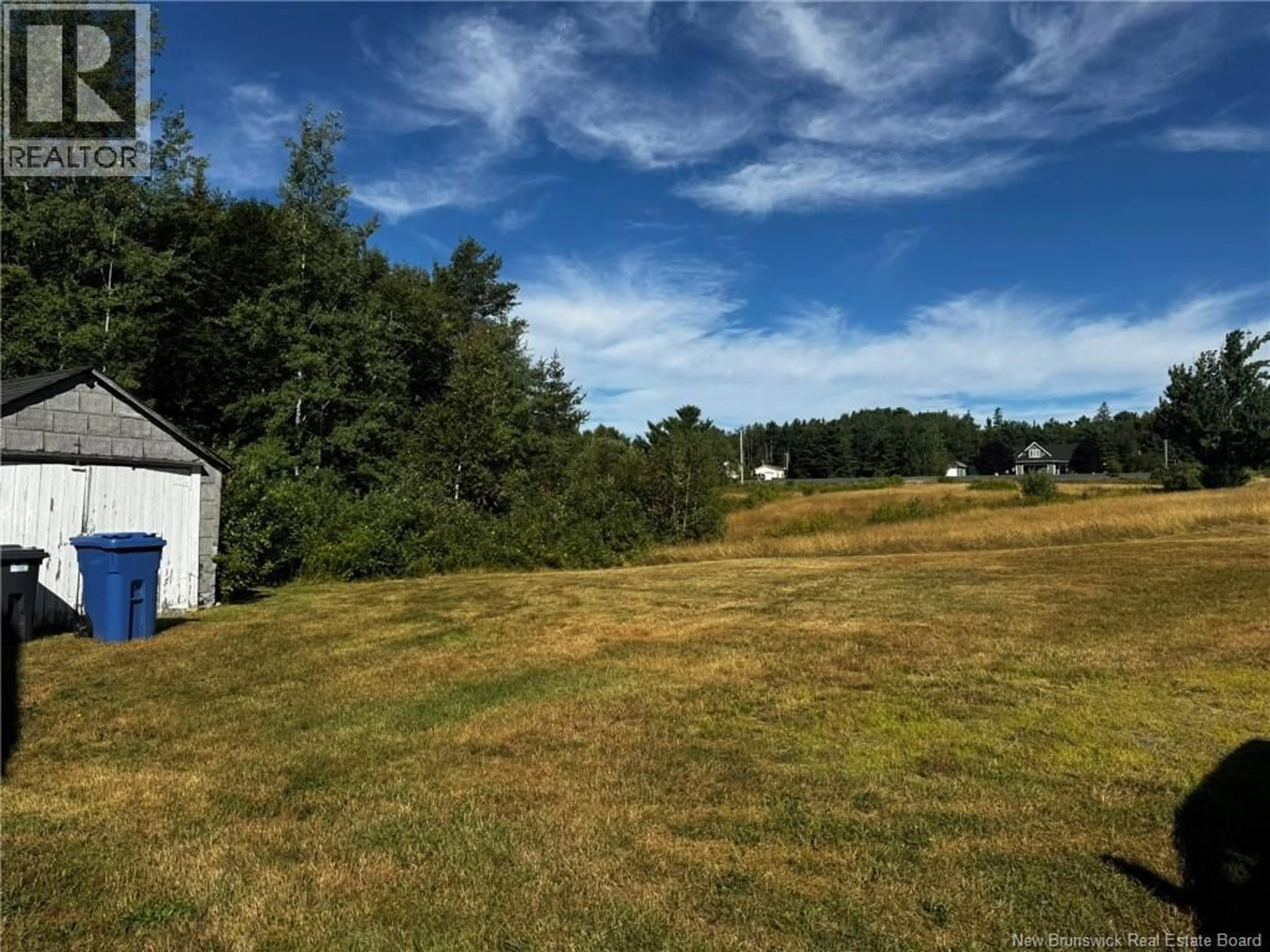 A pic from outside/outdoor area/front of a property/back of a property/a pic from drone, unknown for 352 HWY 11, Lower Newcastle New Brunswick E1V7G1
