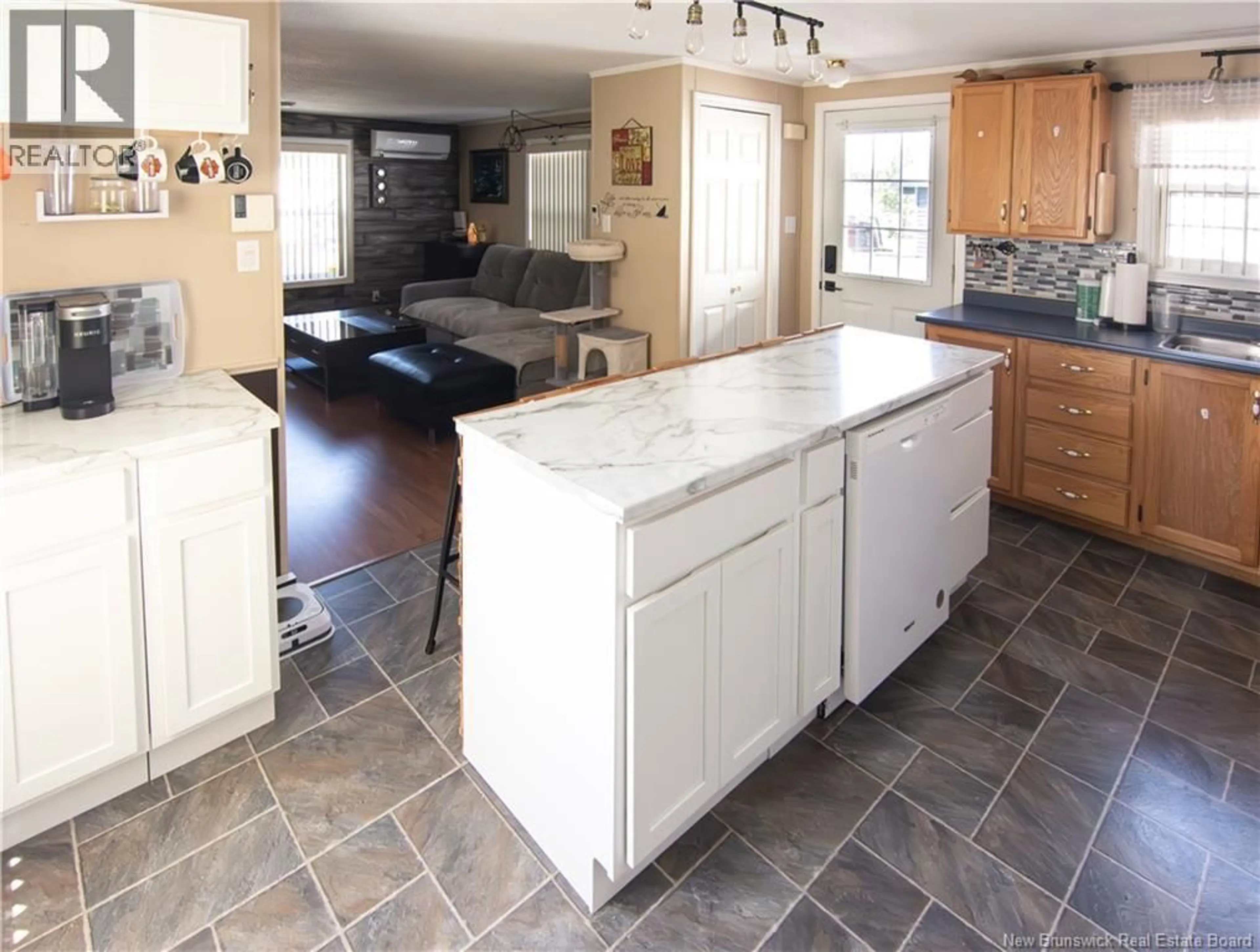Open concept kitchen, ceramic/tile floor for 19 CASCADE AVENUE, Moncton New Brunswick E1E2J8