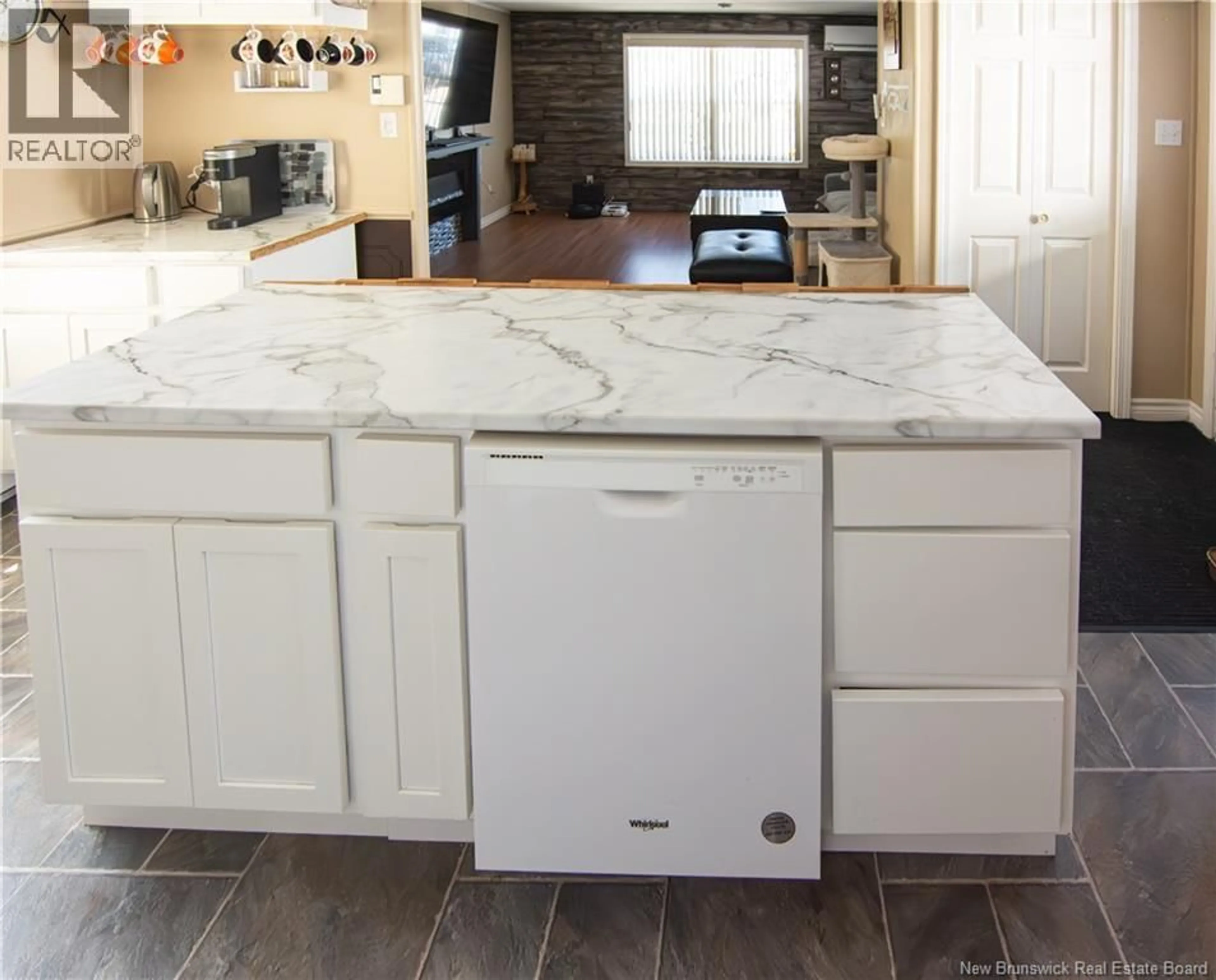 Open concept kitchen, ceramic/tile floor for 19 CASCADE AVENUE, Moncton New Brunswick E1E2J8