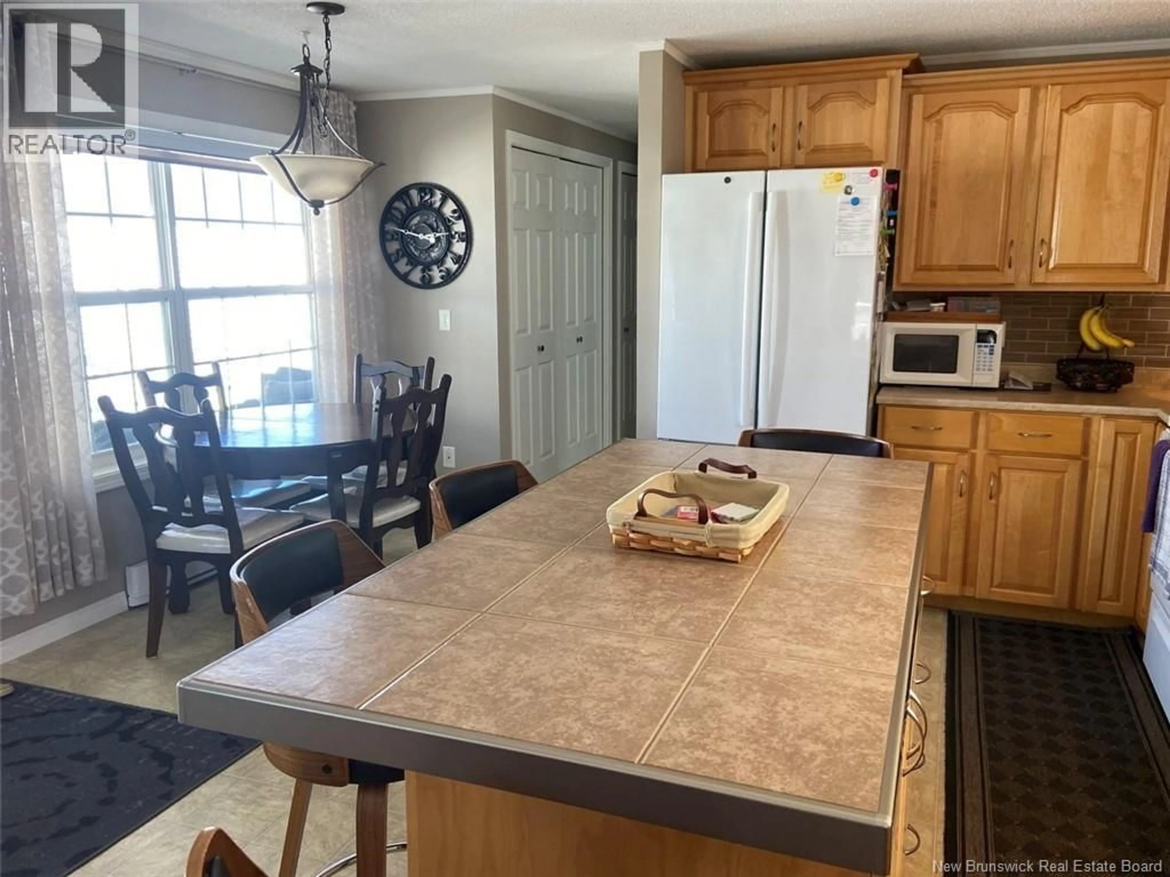 Open concept kitchen, ceramic/tile floor for 45 ALBERT ROAD, Saint-Jacques New Brunswick E7B1Z6
