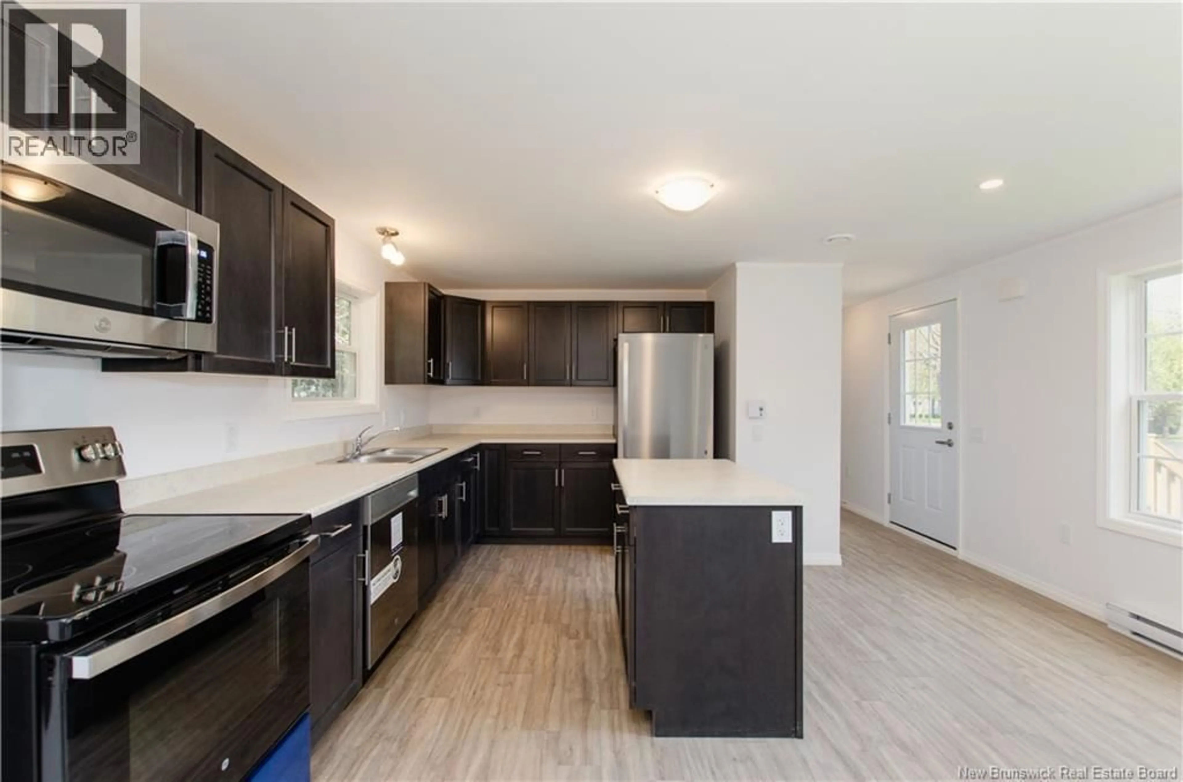 Open concept kitchen, unknown for 11 WILLOWGROVE STREET, Moncton New Brunswick E1H3C2