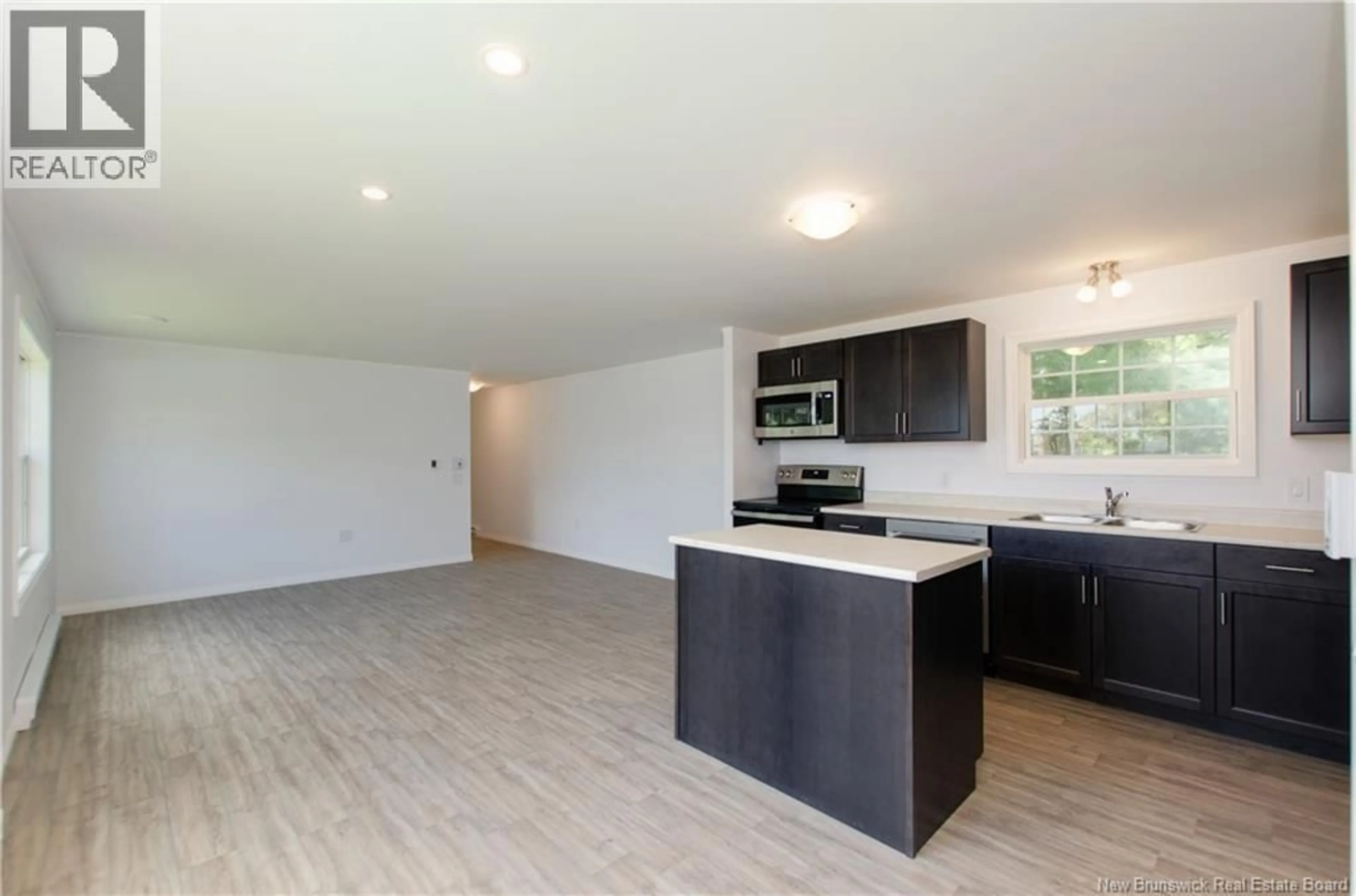 Open concept kitchen, unknown for 11 WILLOWGROVE STREET, Moncton New Brunswick E1H3C2