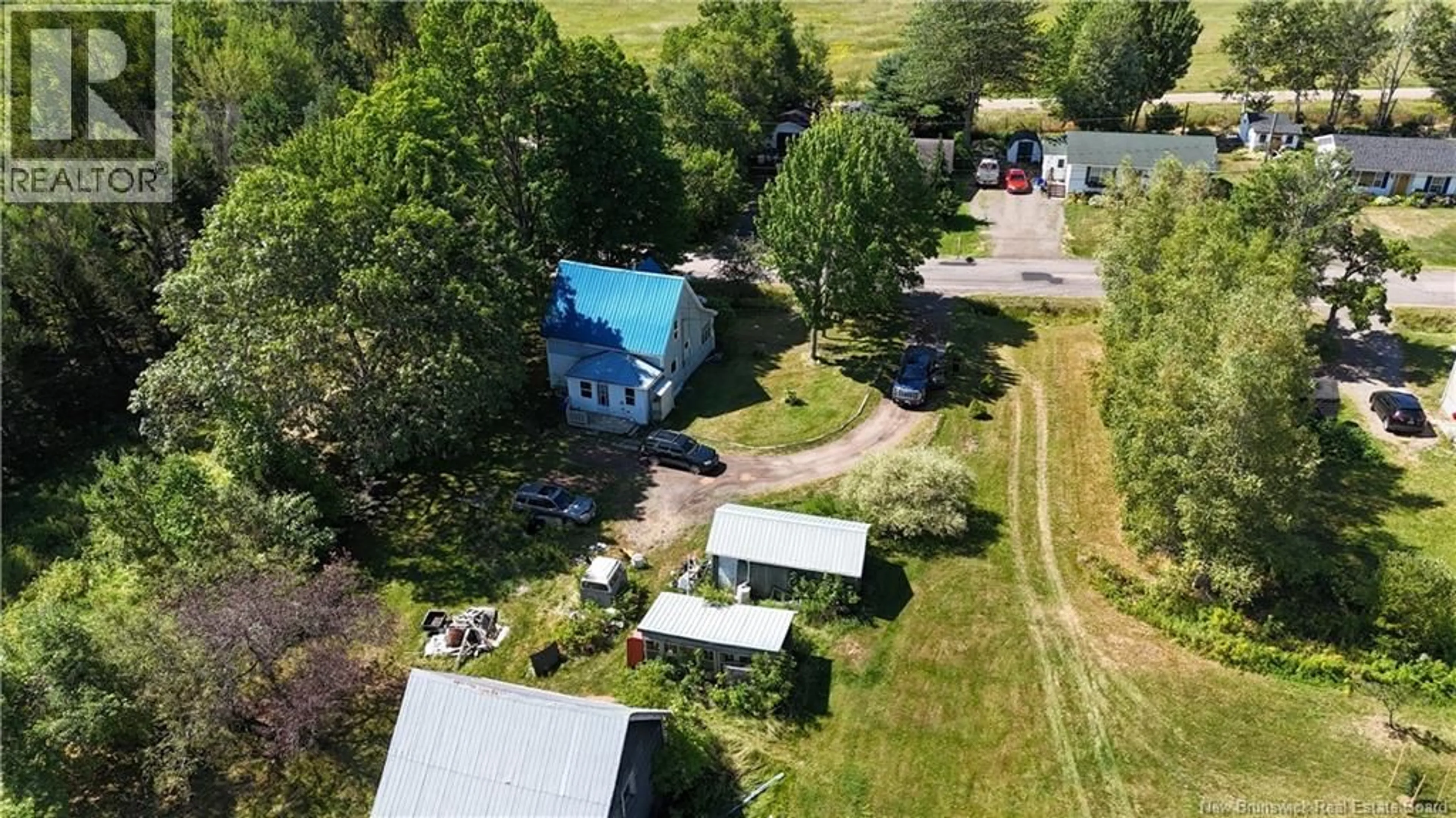 A pic from outside/outdoor area/front of a property/back of a property/a pic from drone, water/lake/river/ocean view for 21 REEDER ROAD, Salisbury New Brunswick E4J2P6