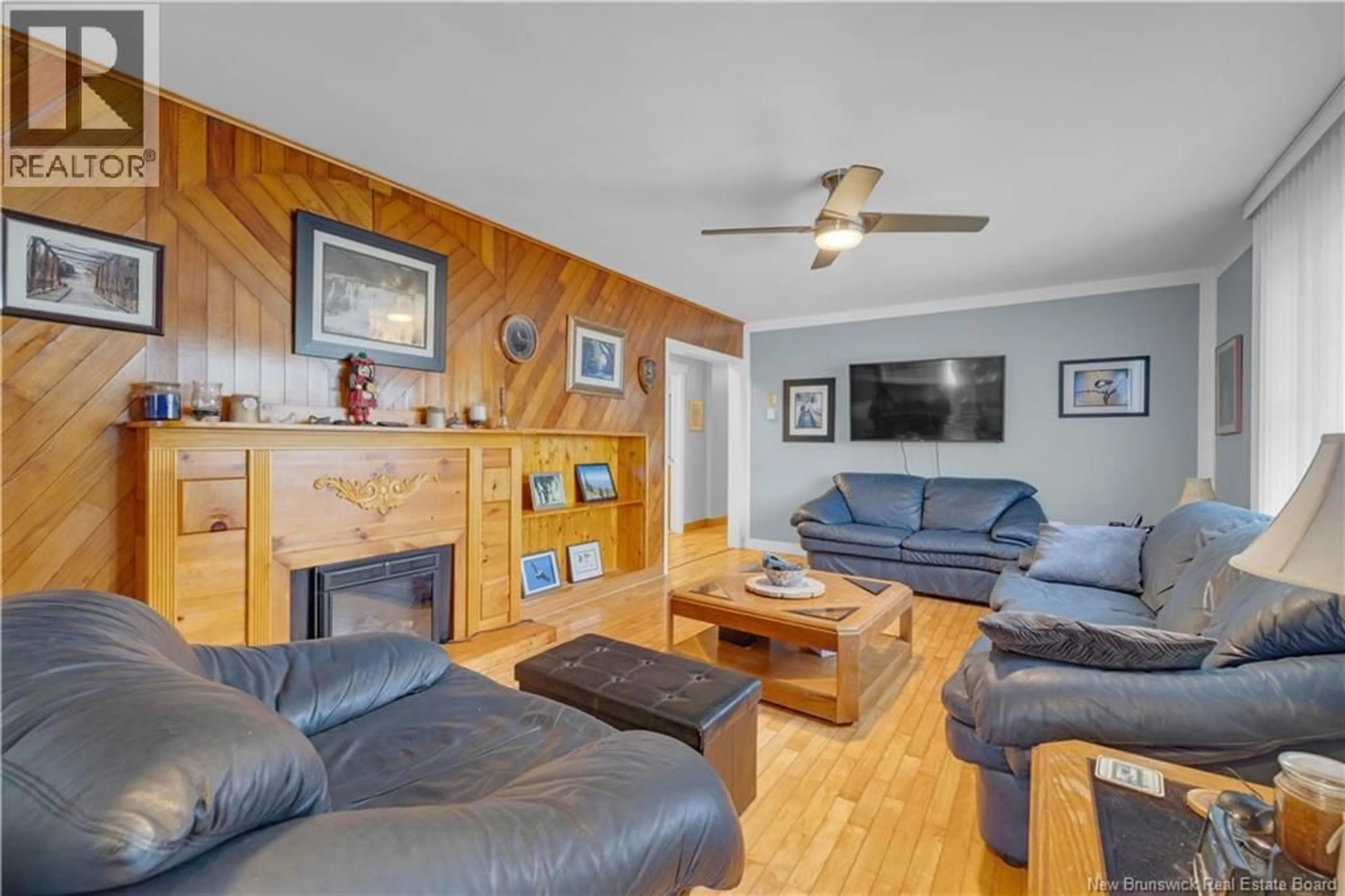 Living room with furniture, wood/laminate floor for 35 BEDELL ROAD, Saint John New Brunswick E2P1H1